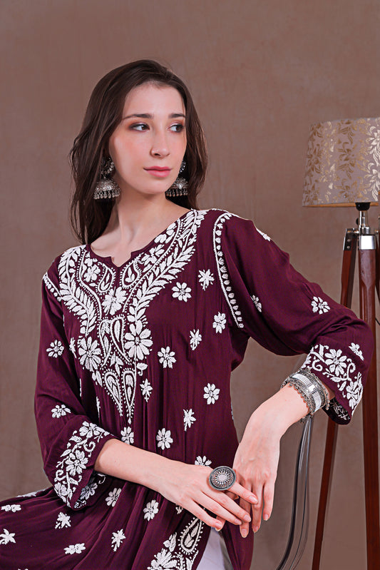 Handcrafted embroidery adds a unique and sophisticated touch.