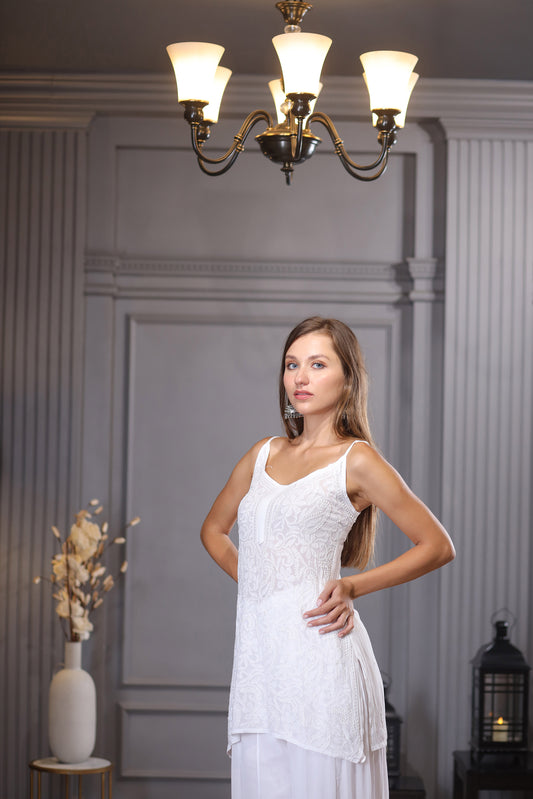 Adorned with full jaal (bakhiya, fanda) embroidery, pairs beautifully with flaired pants for an elegant look.