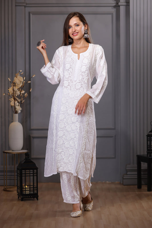 Features delicate pintuck detailing and heavy floral jaal embroidery