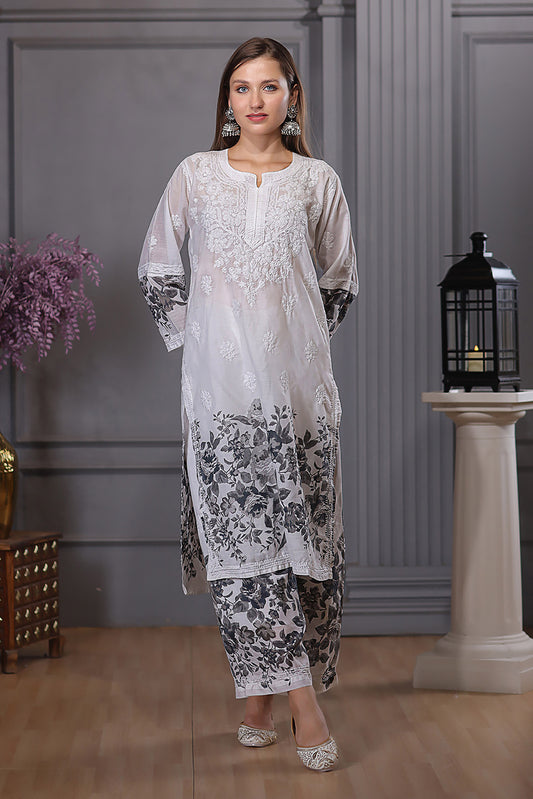 Adorned with exquisite chikankari embroidery with kashmiri neck design.