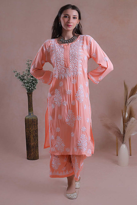 This kurta set classic ensemble adorned with intricate hand-embroidered Chikankari motifs