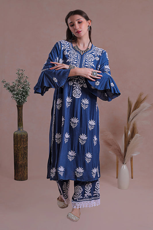 Chikankari blue kurta set, a classic ensemble adorned with intricate hand-embroidered Chikankari motifs.