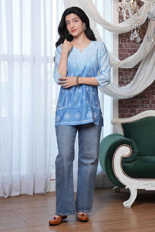 The intricate white chikankari detailing enhances the kurta’s charm