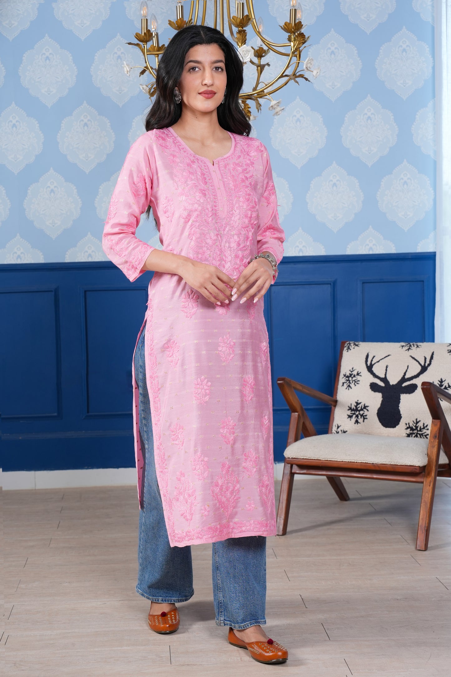 The pretty printed pink chikankari detailing enhances the kurta’s charm.