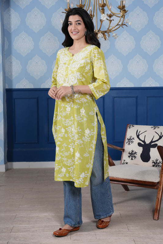 the intricate white chikankari detailing enhances the kurta’s charm
