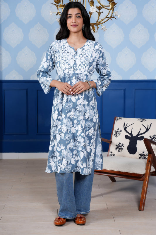 The intricate white chikankari detailing enhances the kurta’s charm