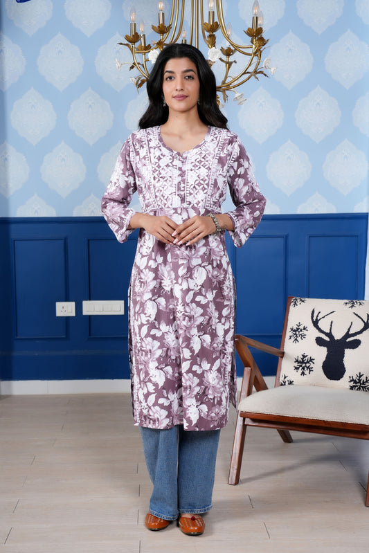the intricate white chikankari detailing enhances the kurta’s charm
