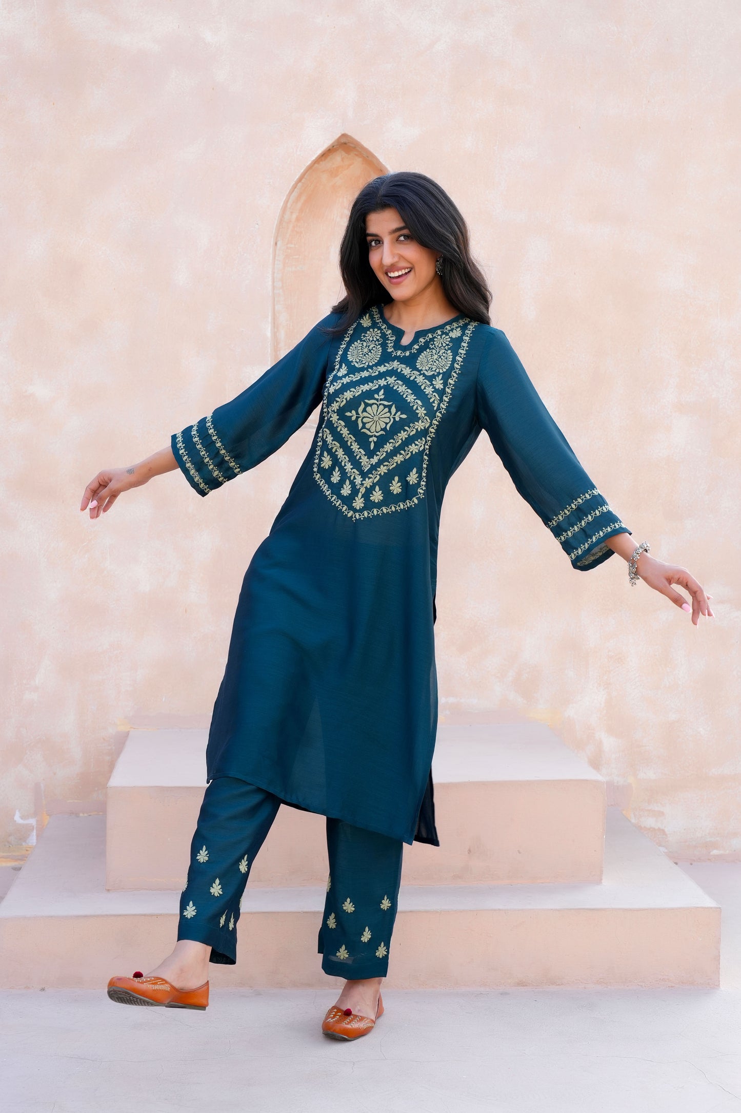 The elegantly embellished Emerald Green Kurta set is made from very premium and skin friendly poly silk fabric.