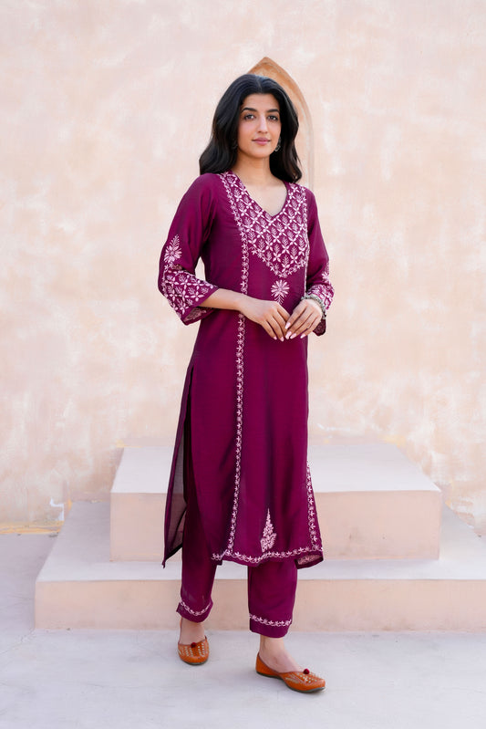 Handcrafted embroidery adds a unique and sophisticated touch.