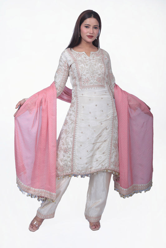 luxury with this pretty Kurta set that comes with a contrast beautiful Dupatta in a fabric that oozes elegance.