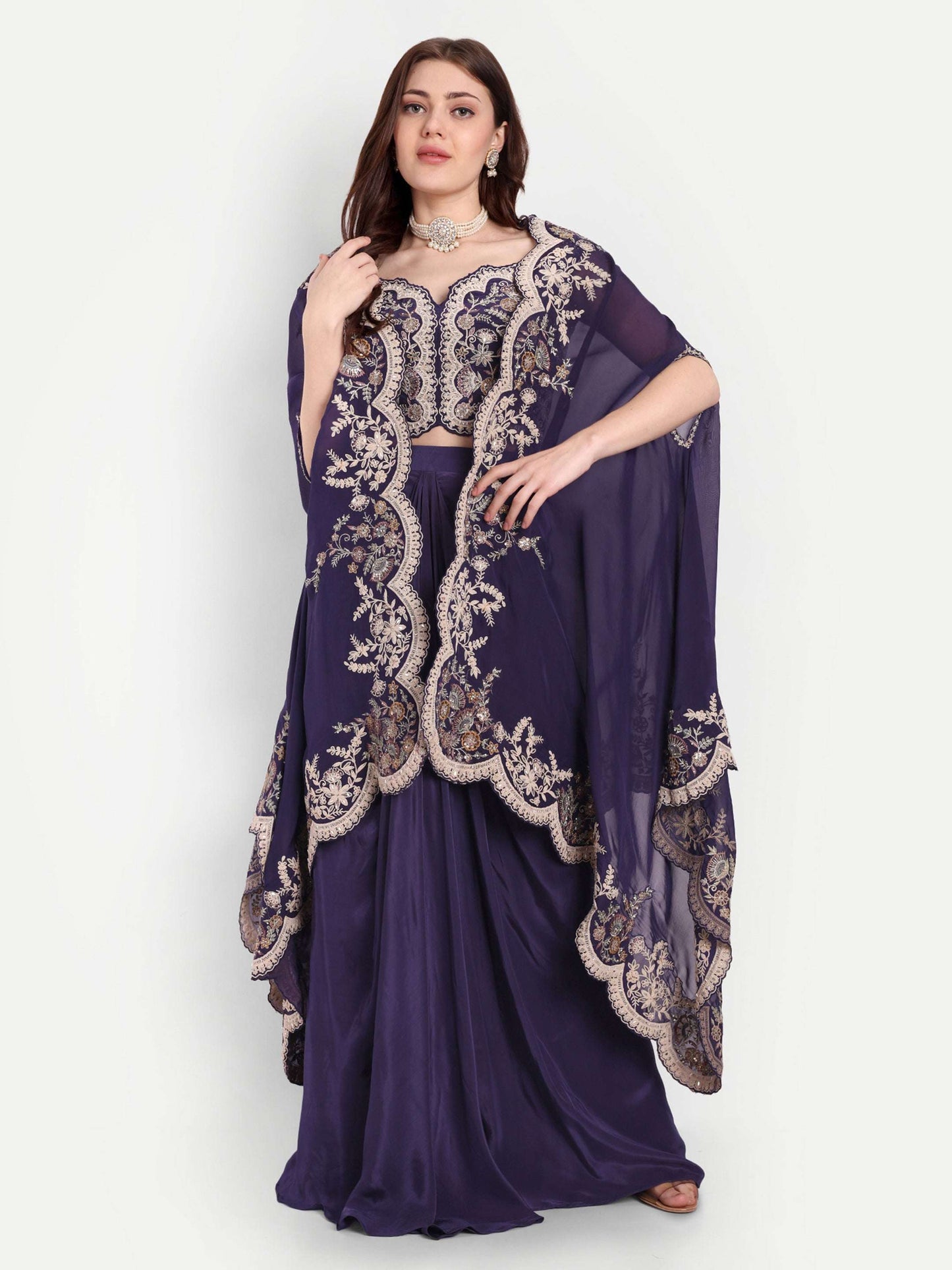 Zardozi work all over at the blouse and cape