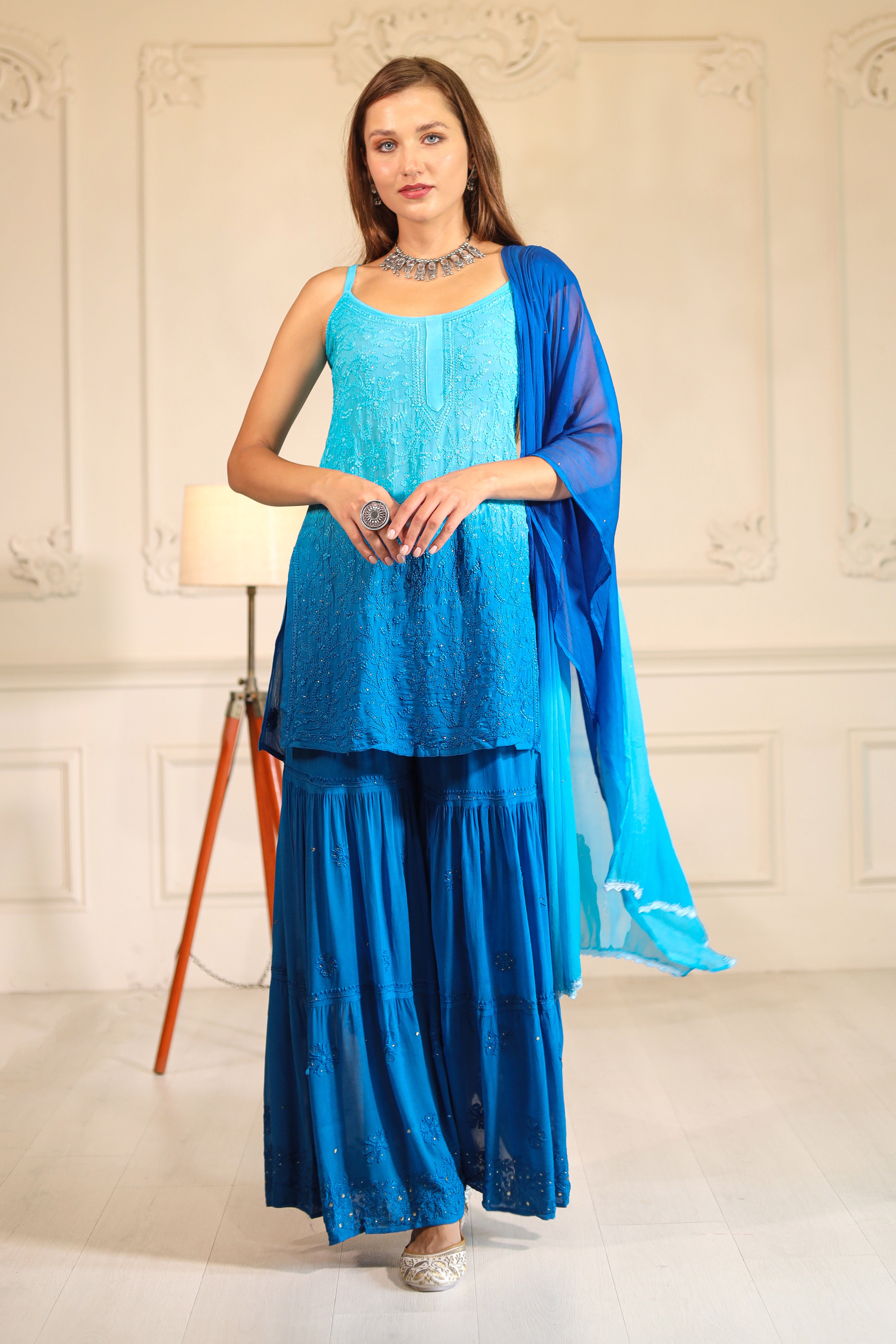 Dazzle in our hand crafted ombre shaded Blue georgette Sharara set