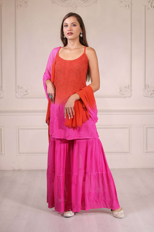 Hand crafted ombre shaded pink and orange georgette Sharara set.