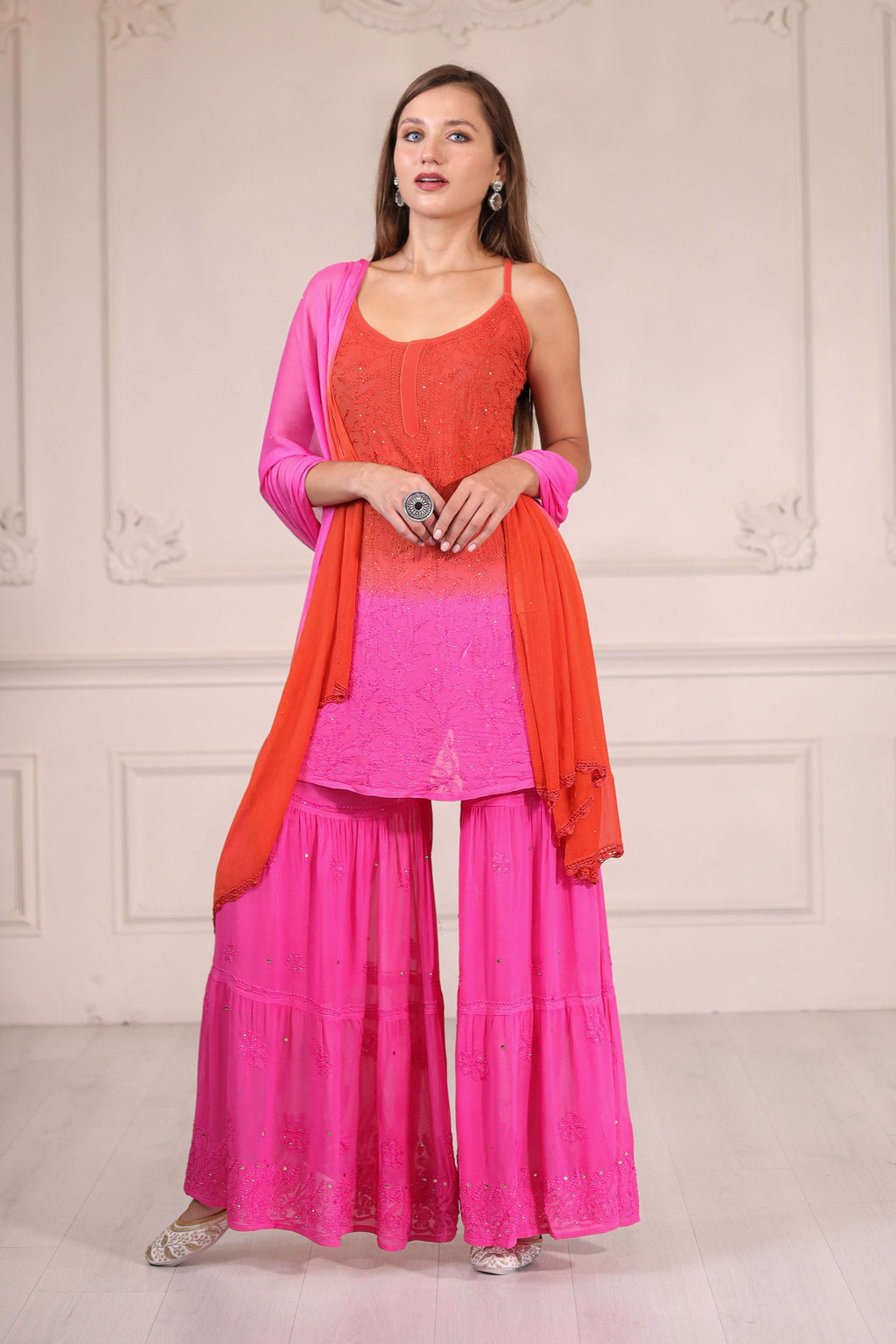 The graceful ombre effect blends vibrant orange hues