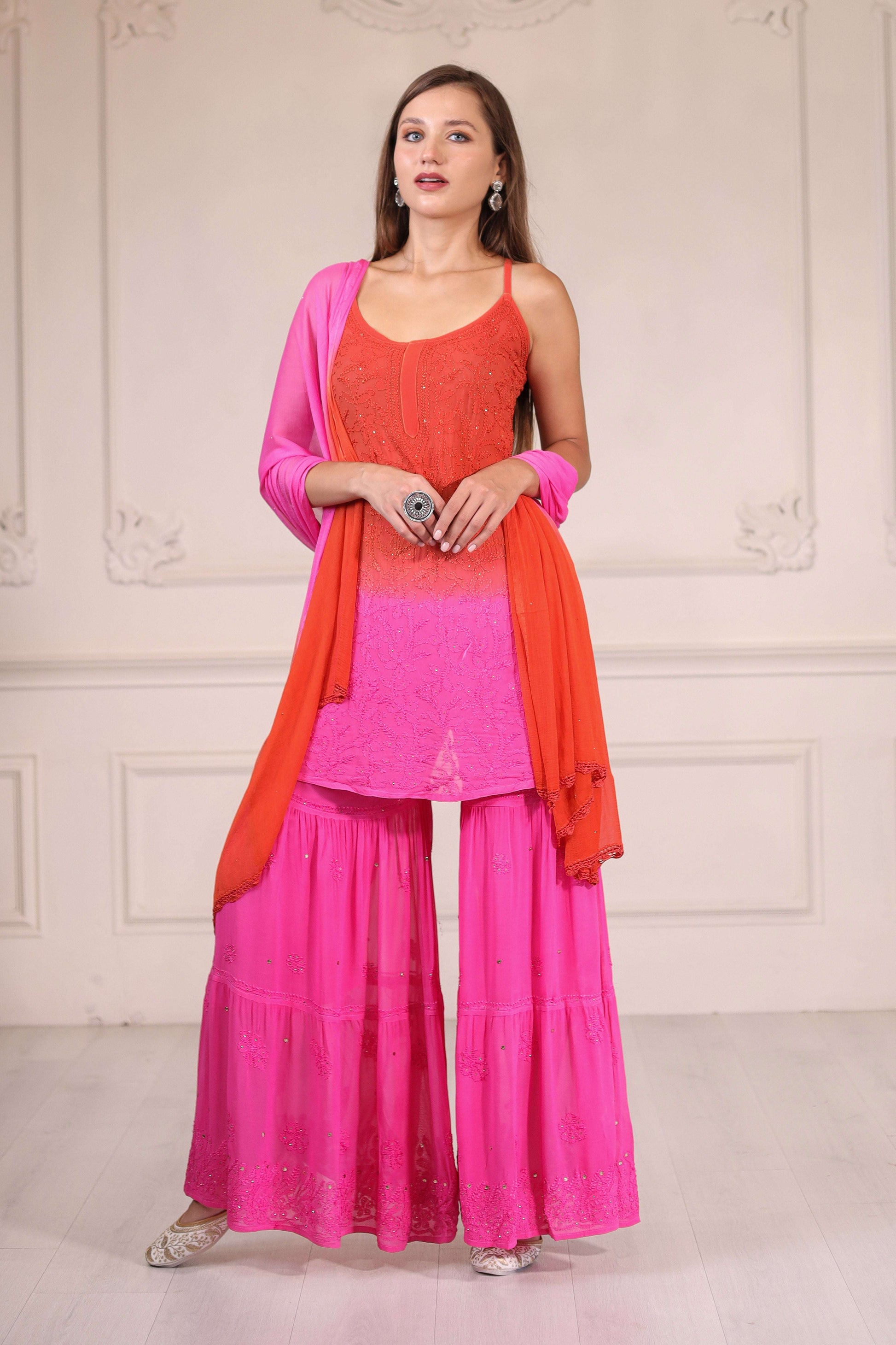 The graceful ombre effect blends vibrant orange hues