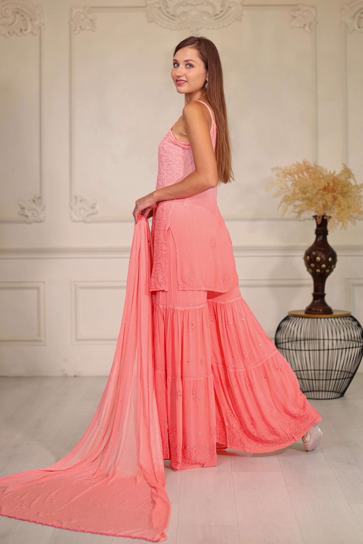 Handcrafted embroidery adds a unique and sophisticated touch