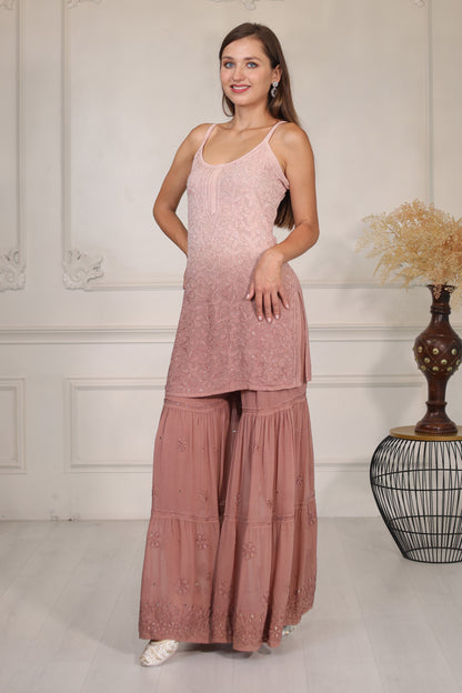 The elegantly embellished Pink Sharara set is made from very premium and skin friendly georgette fabric.

