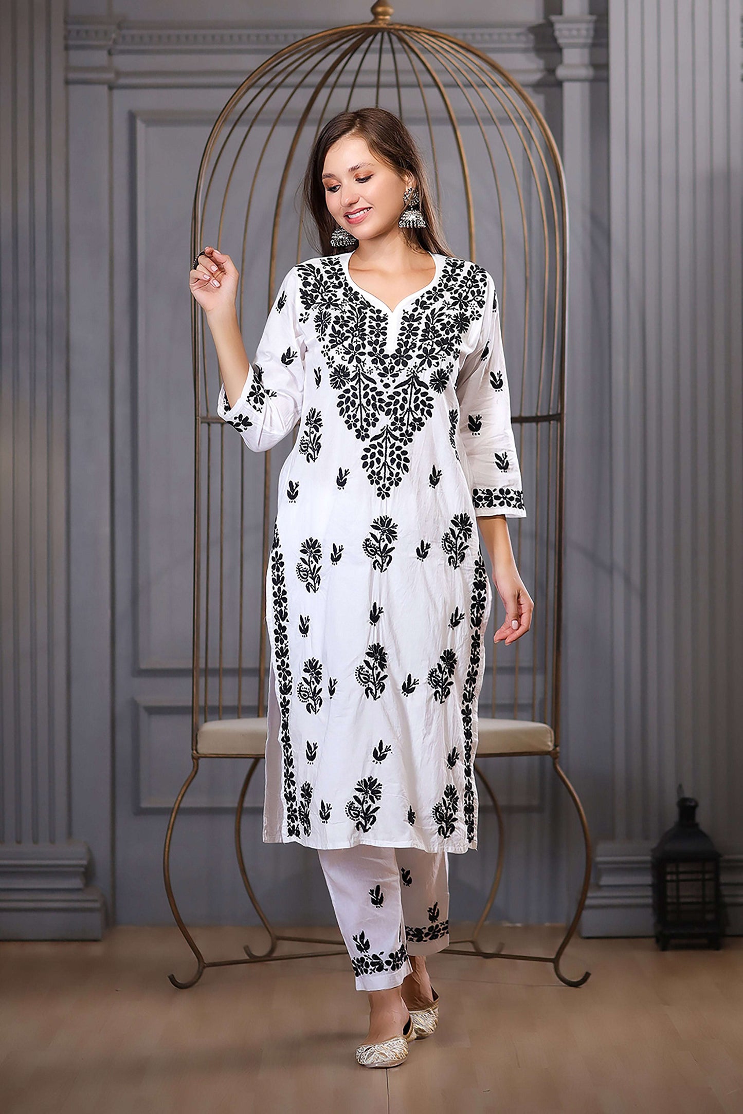 this kurta set hand embroidered and black thread work 