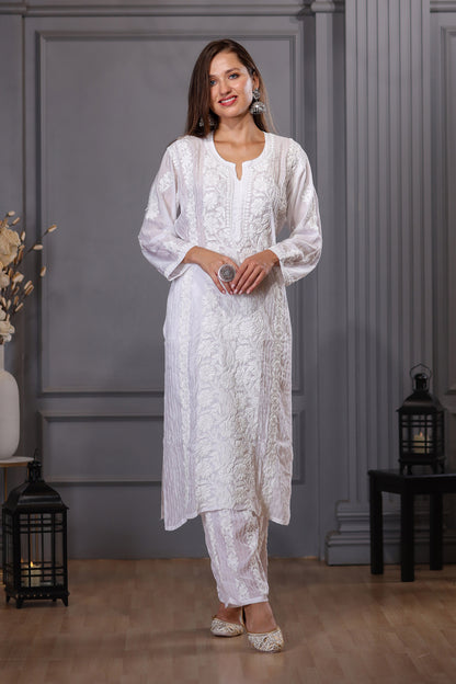 This paneled white muslin kurti with pant