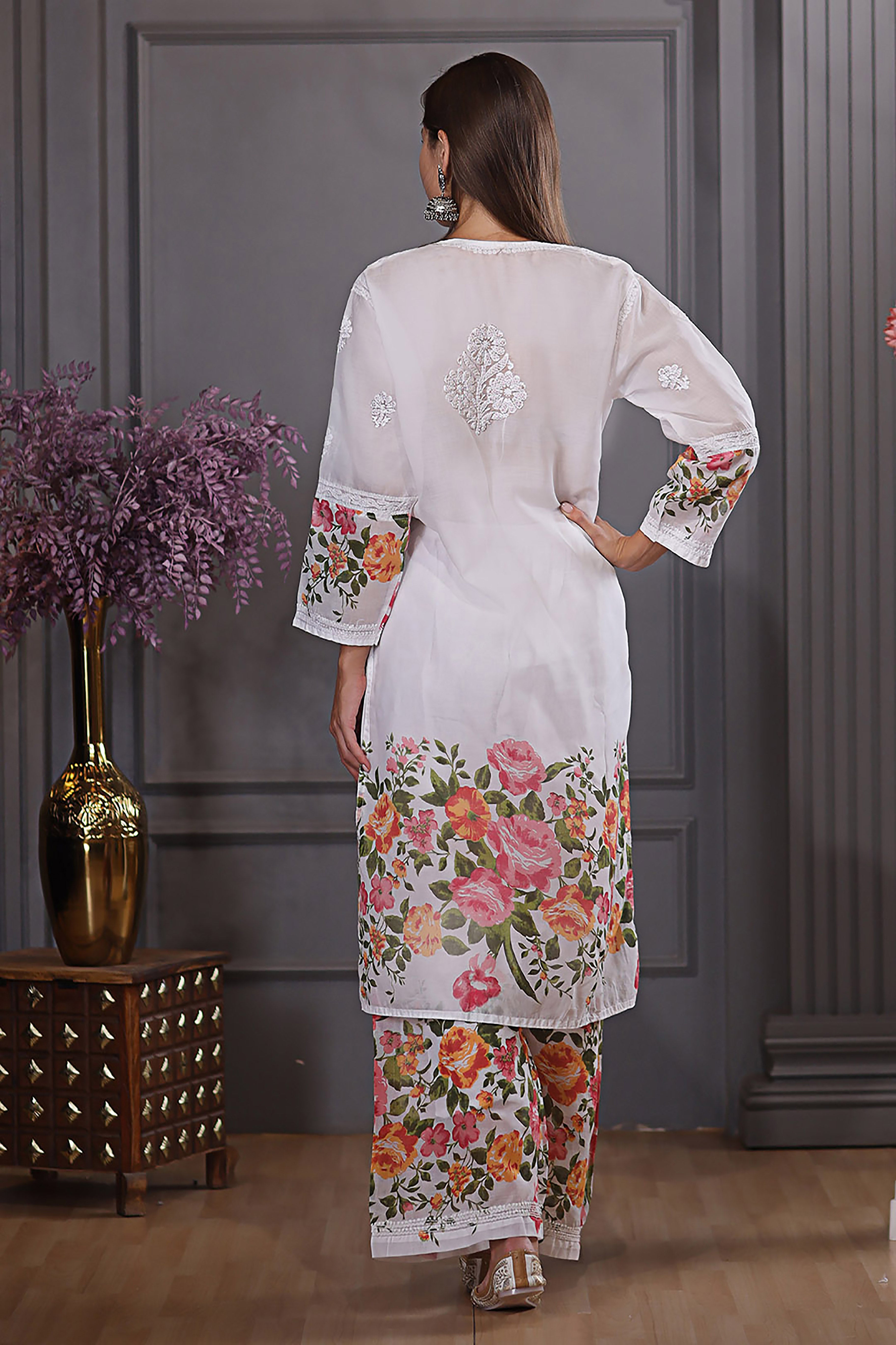 The floral design and chikankari detailing add elegance. it combines comfort with refined style.