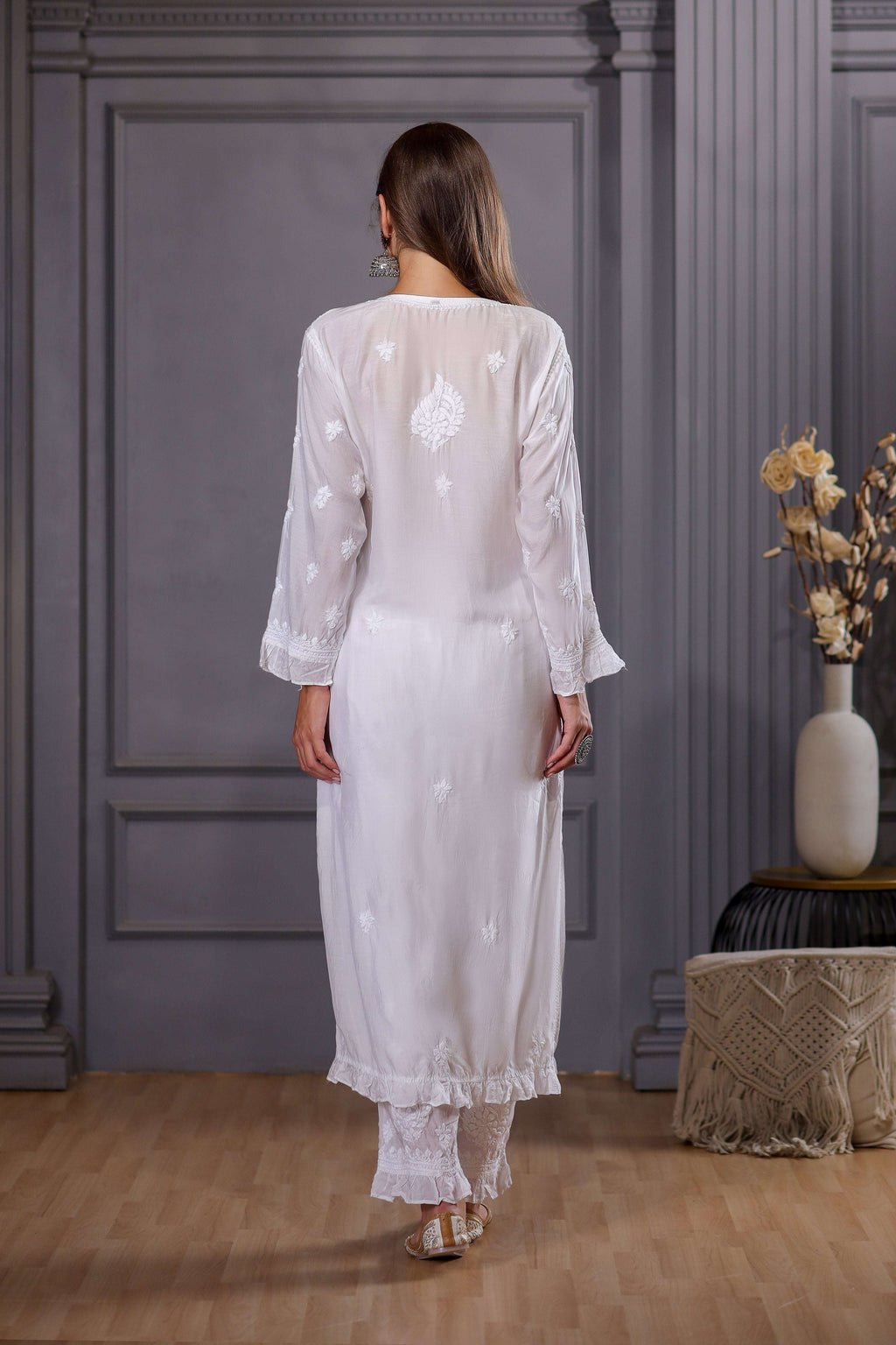 floral embroidery on front, back and sleeves.