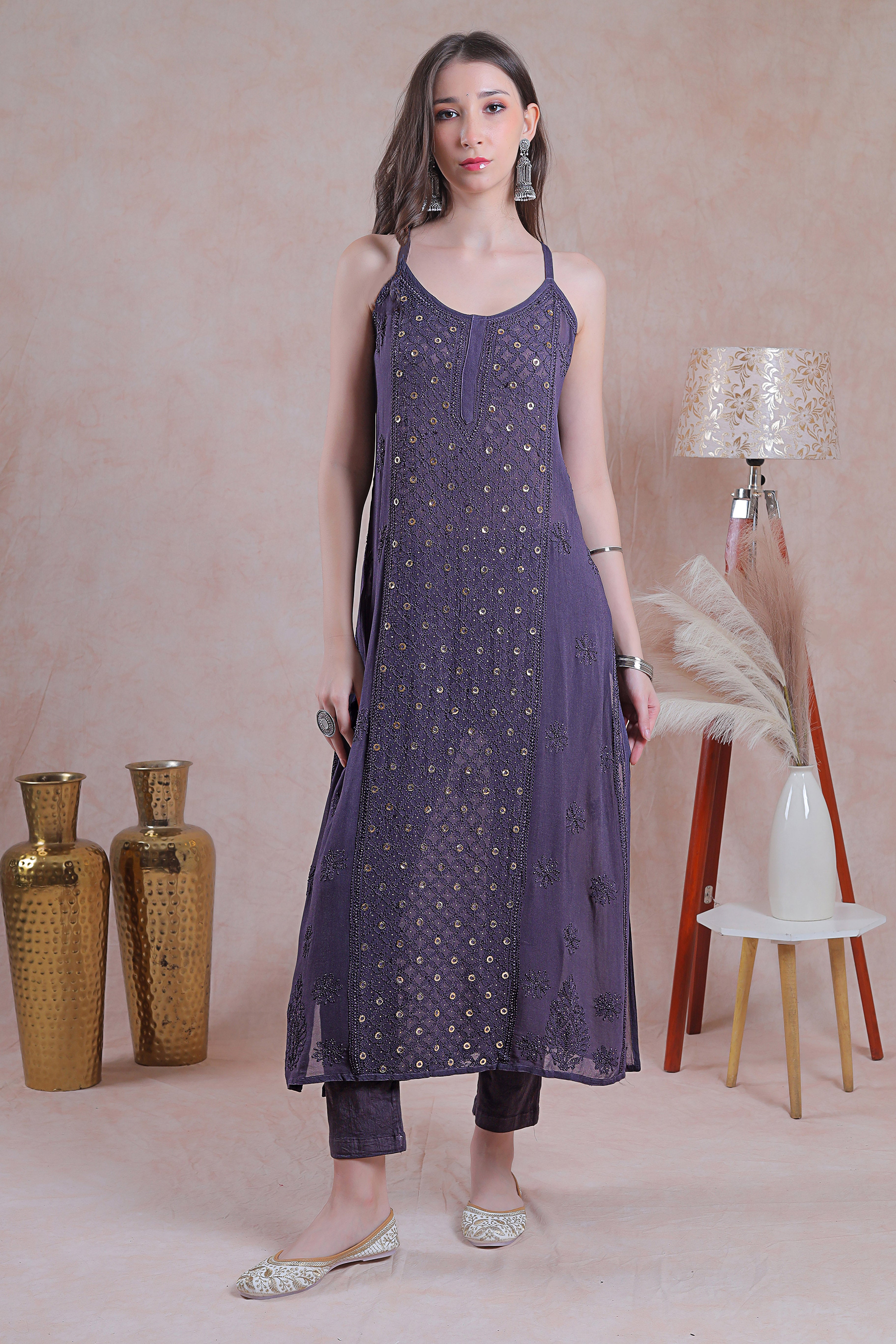 Featuring intricate resham thread chikankari and sparkling ring mukaish.