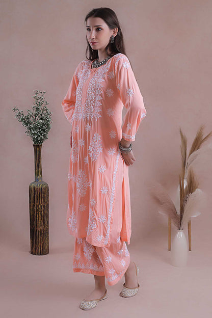 rich white hue enhances the delicate chikankari hand embroidery