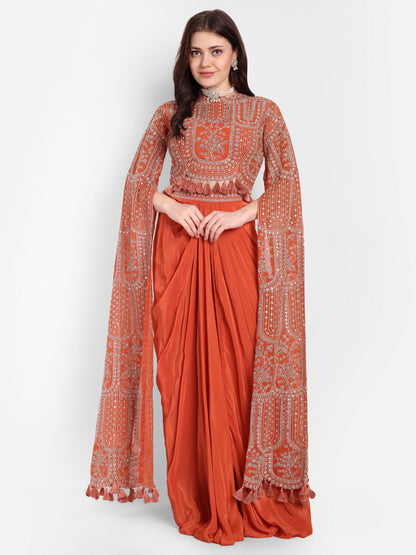 This pure Crepe fabric and a slit sleeve blouse this outfit is the epitome of panache. 