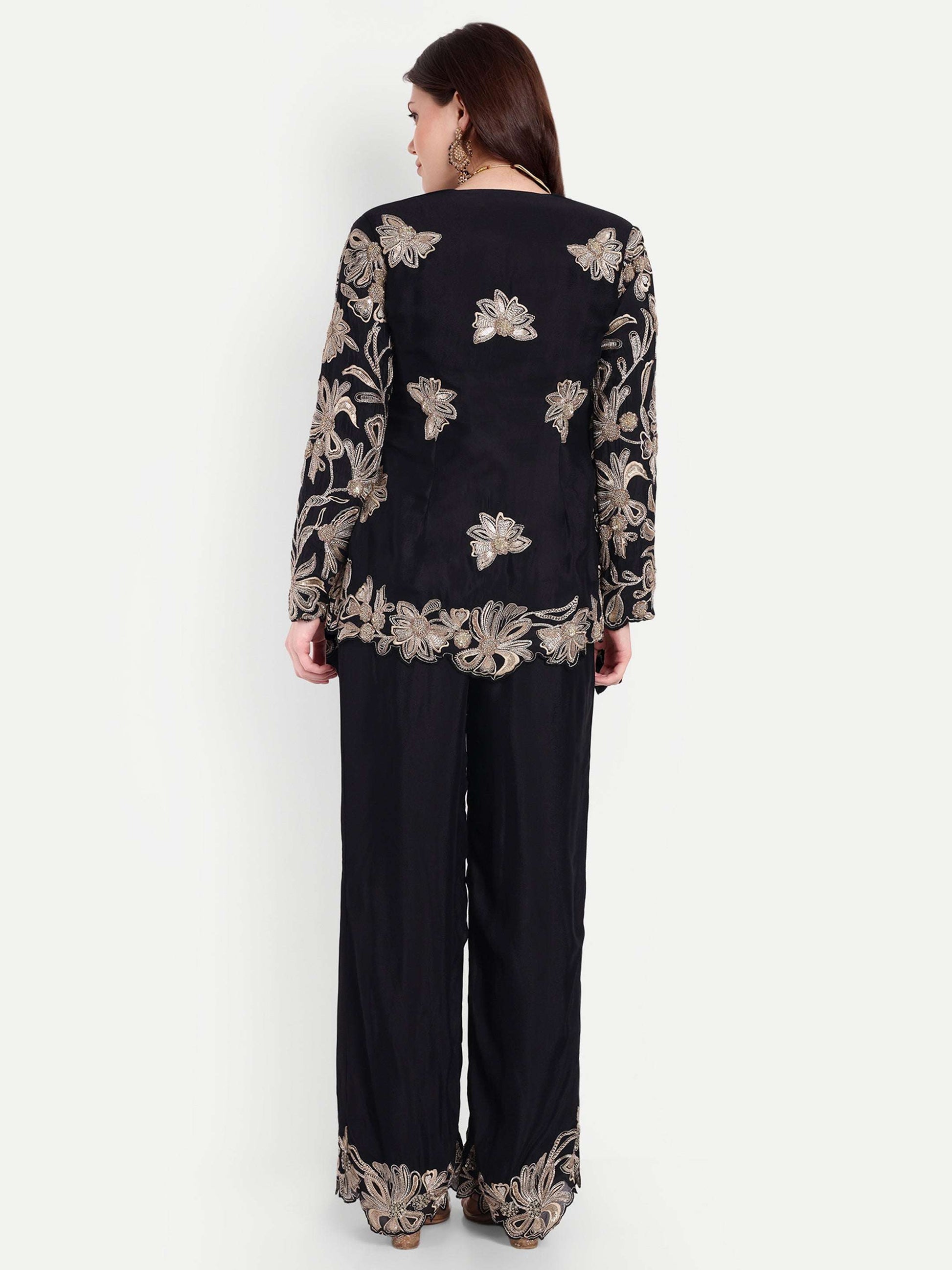 Intricate floral embroidery on front, back and sleeves.