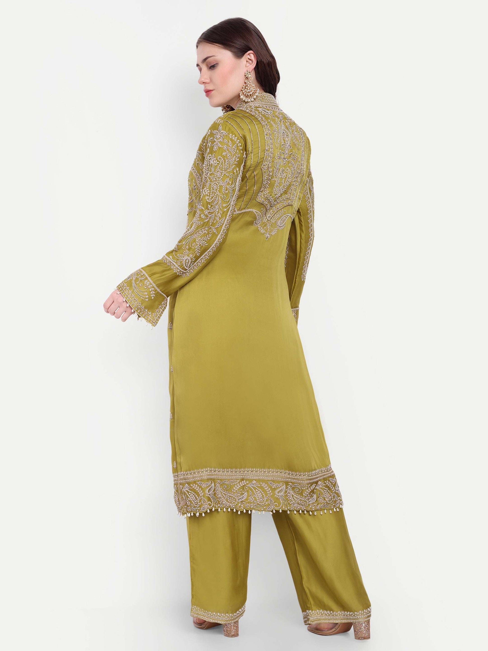 Intricate floral embroidery on front, back and sleeves.