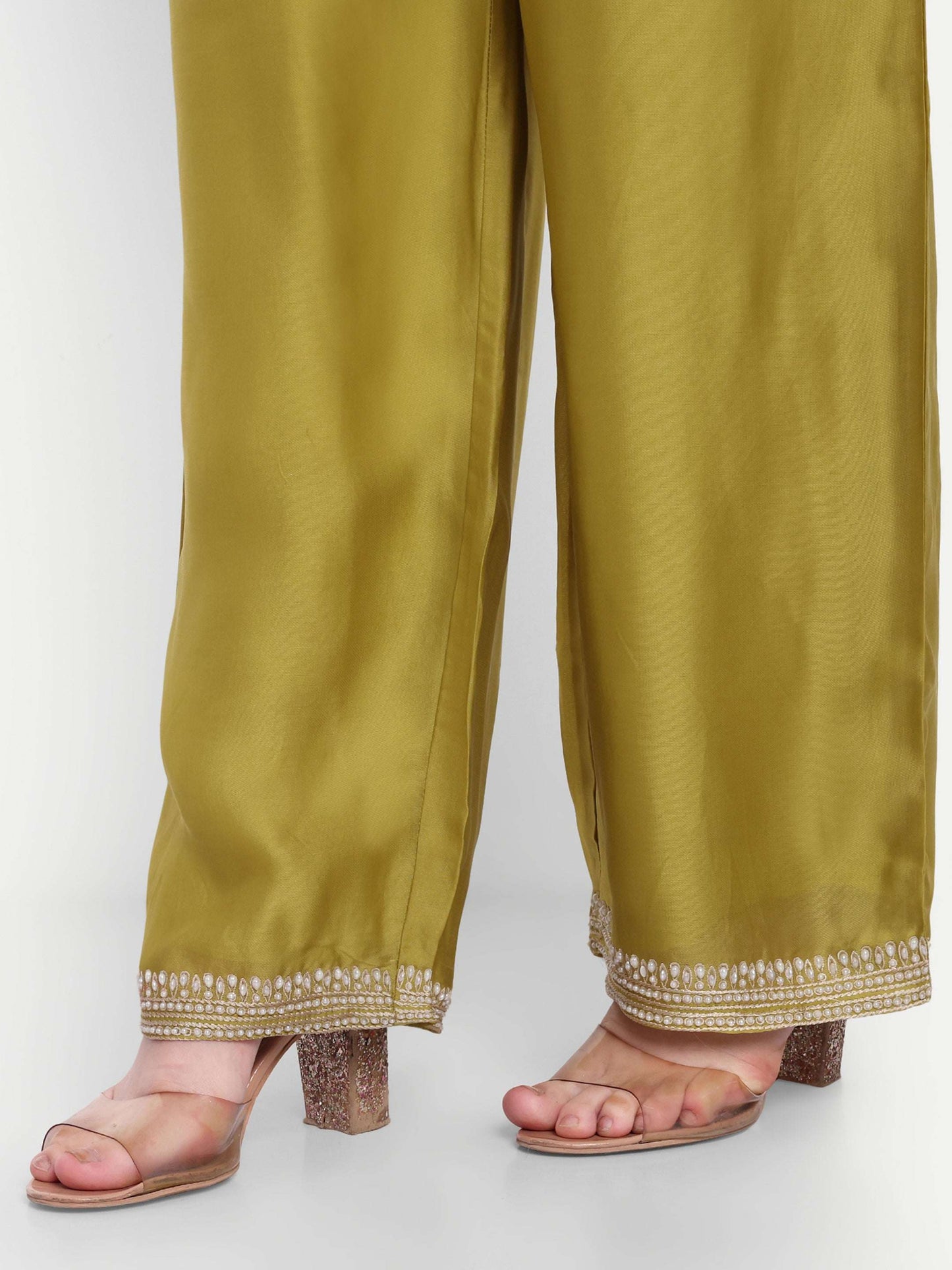 olive green pant is designed with classy embroidery and pearl work border 