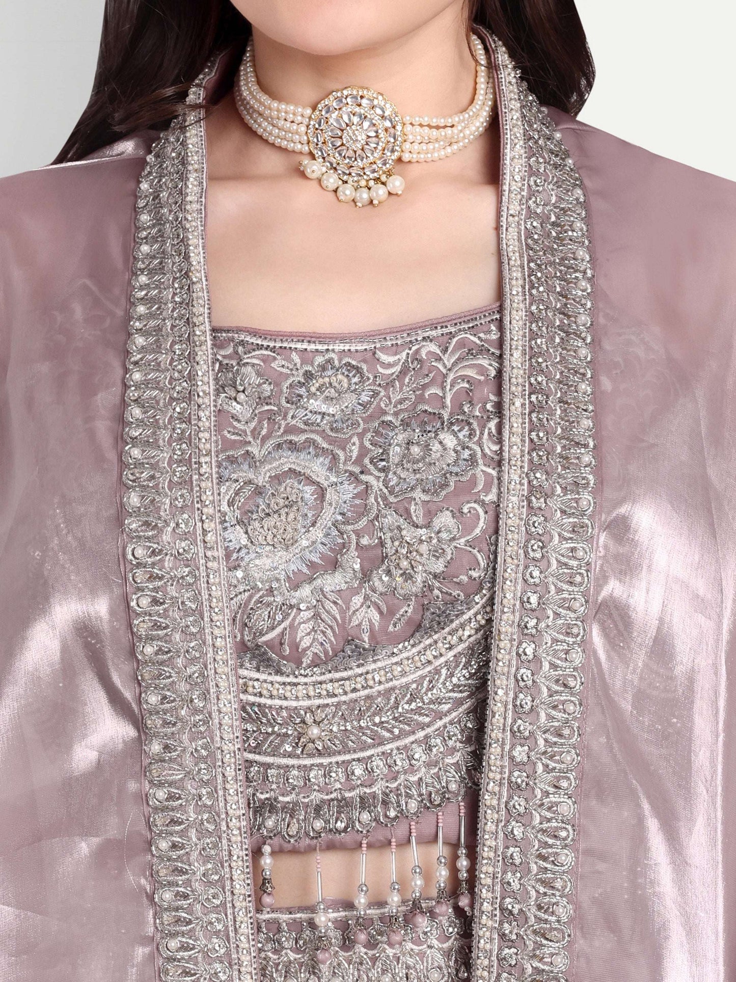 cape is designed with elegant threadwork and white sequin work