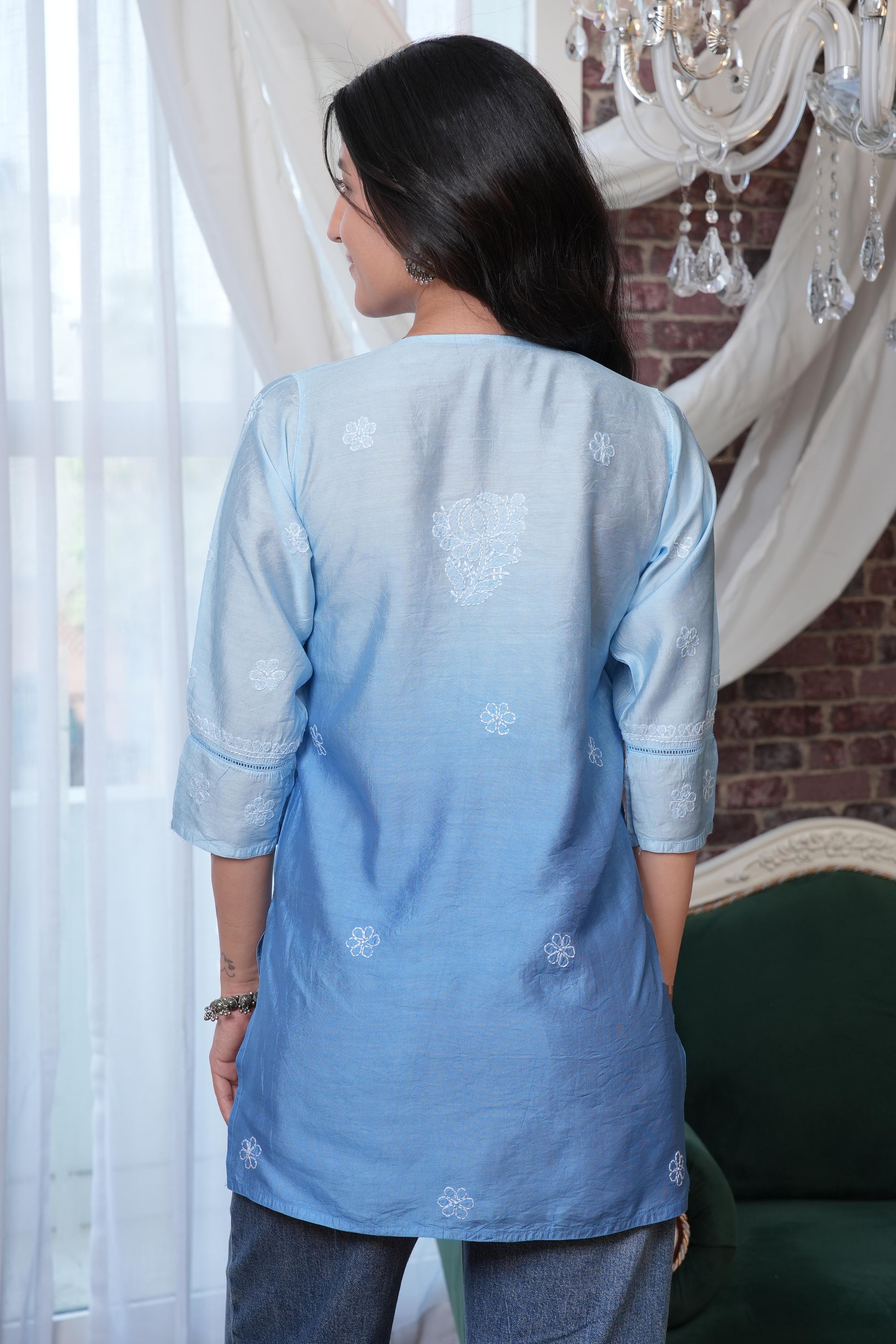 The soft, breathable muslin fabric drapes effortlessly, providing all day comfort.