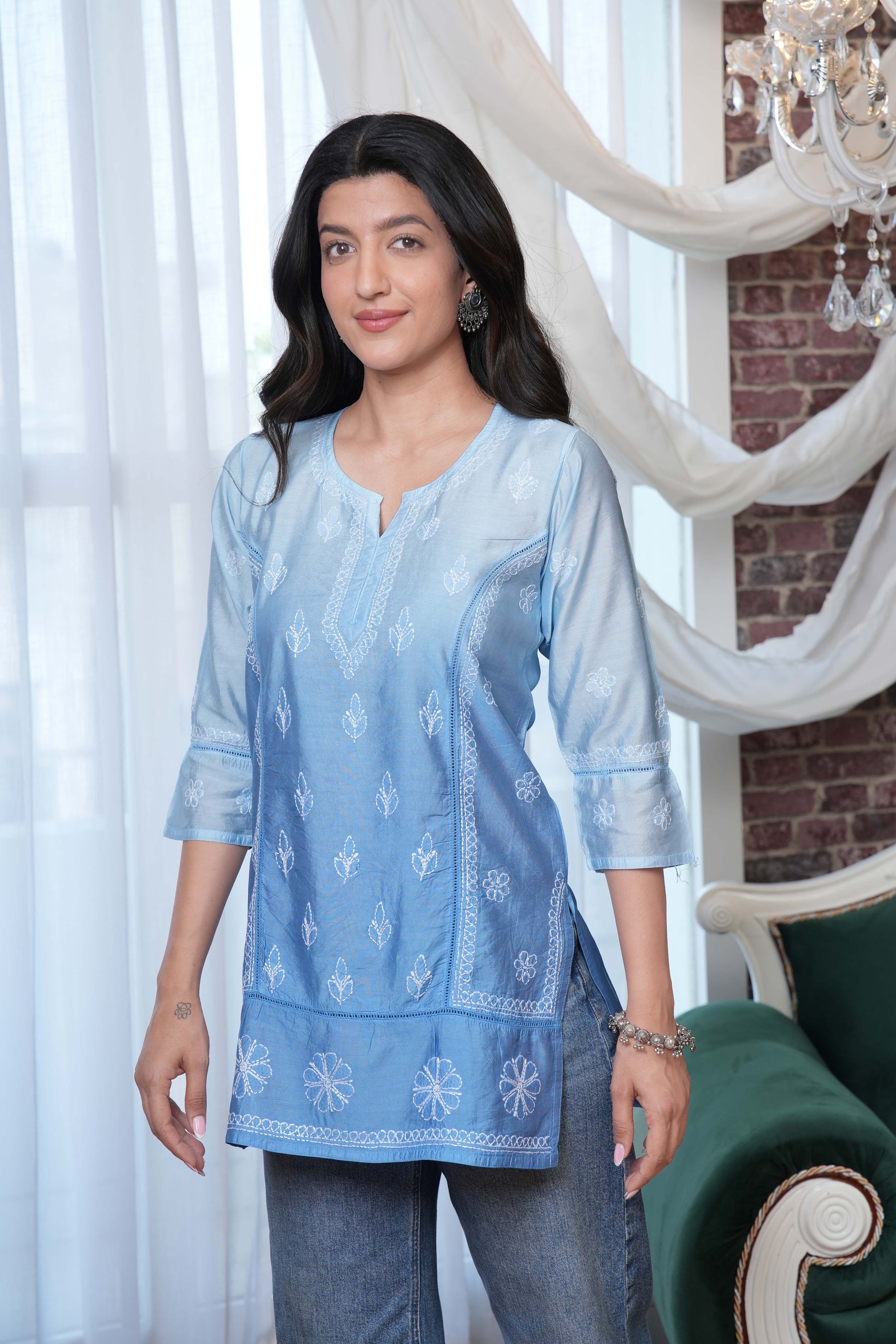 This short kurta Offering a subtle yet sophisticated touch