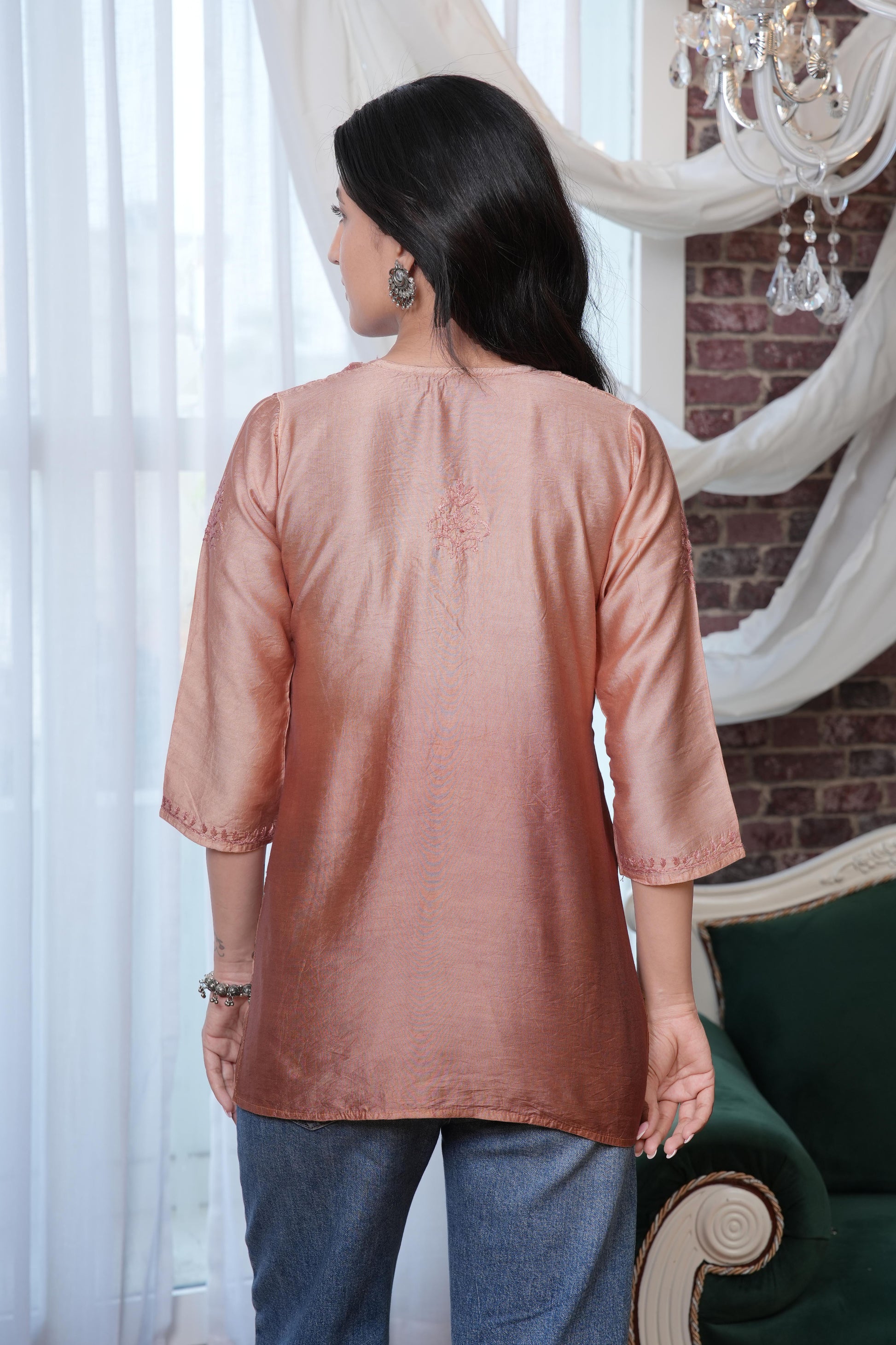 The soft, breathable muslin fabric drapes effortlessly, providing all day comfort.