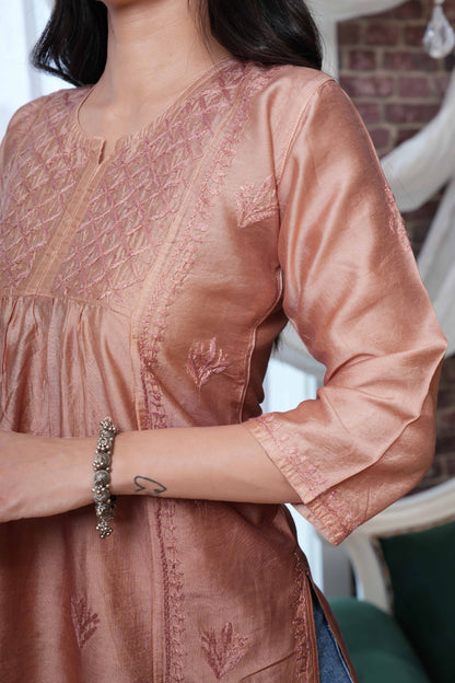 The asymmetricel yoke design adds a contemporary twist.