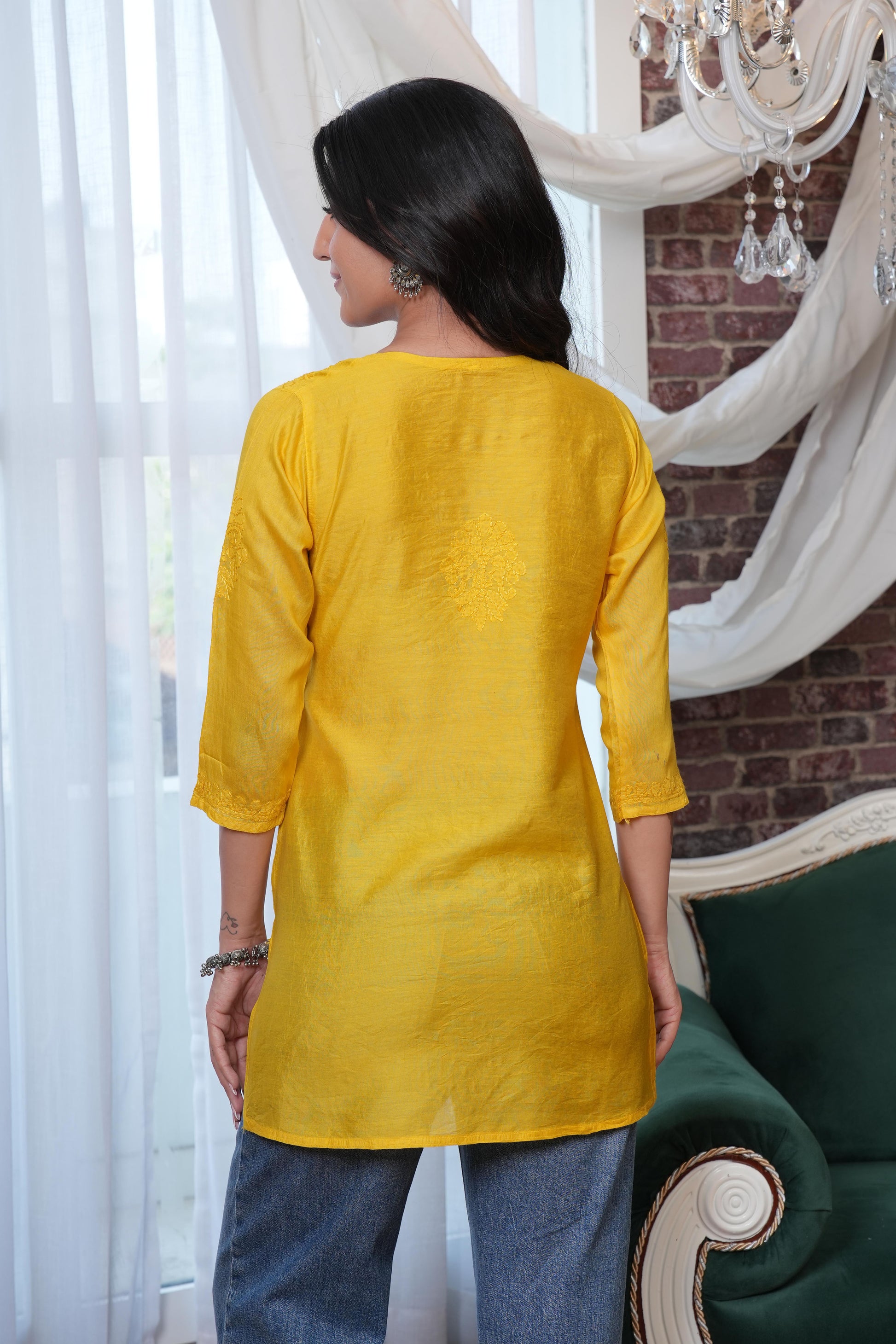 The soft, breathable muslin fabric drapes effortlessly, providing all day comfort.