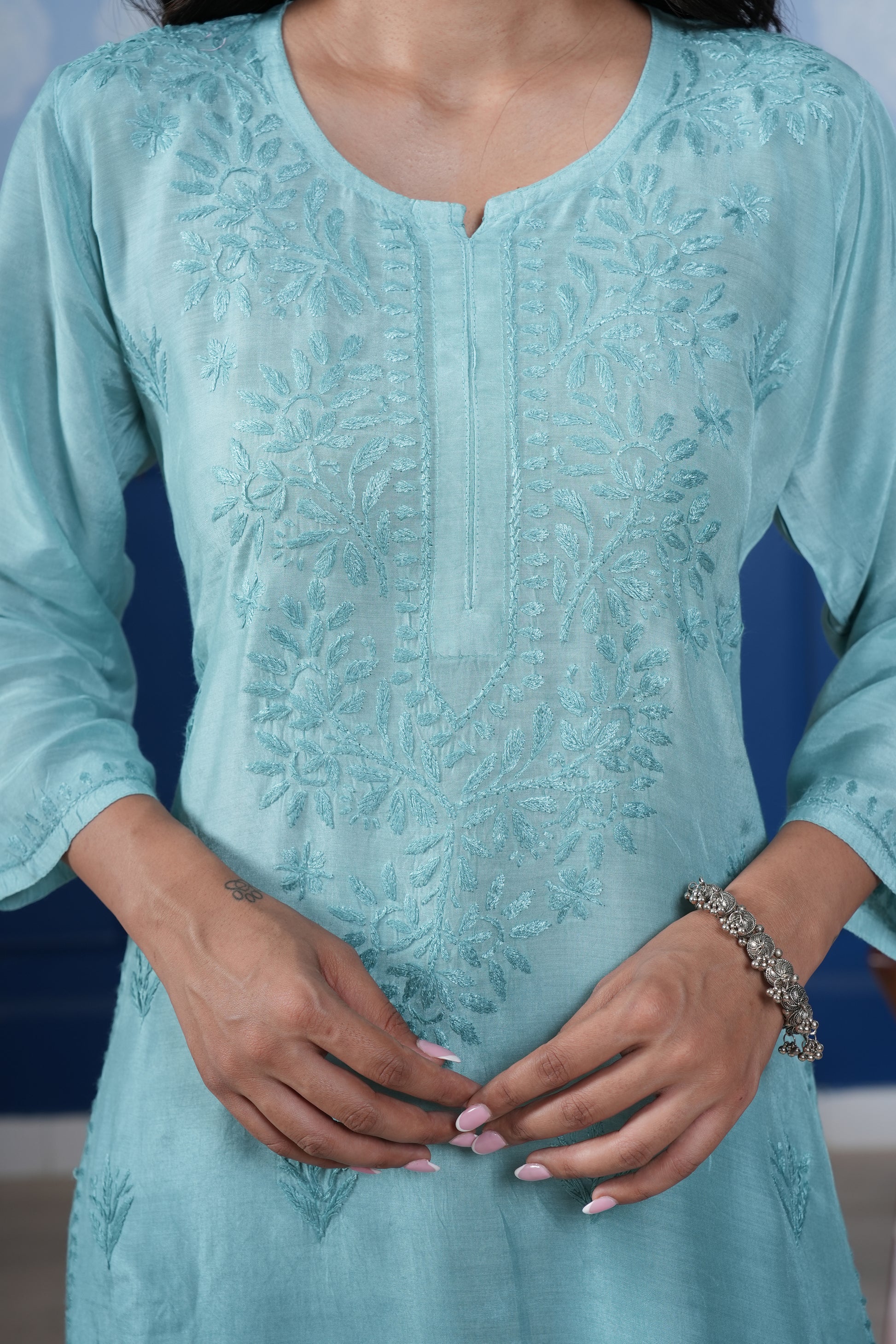 The asymmetricel yoke design adds a contemporary twist.
