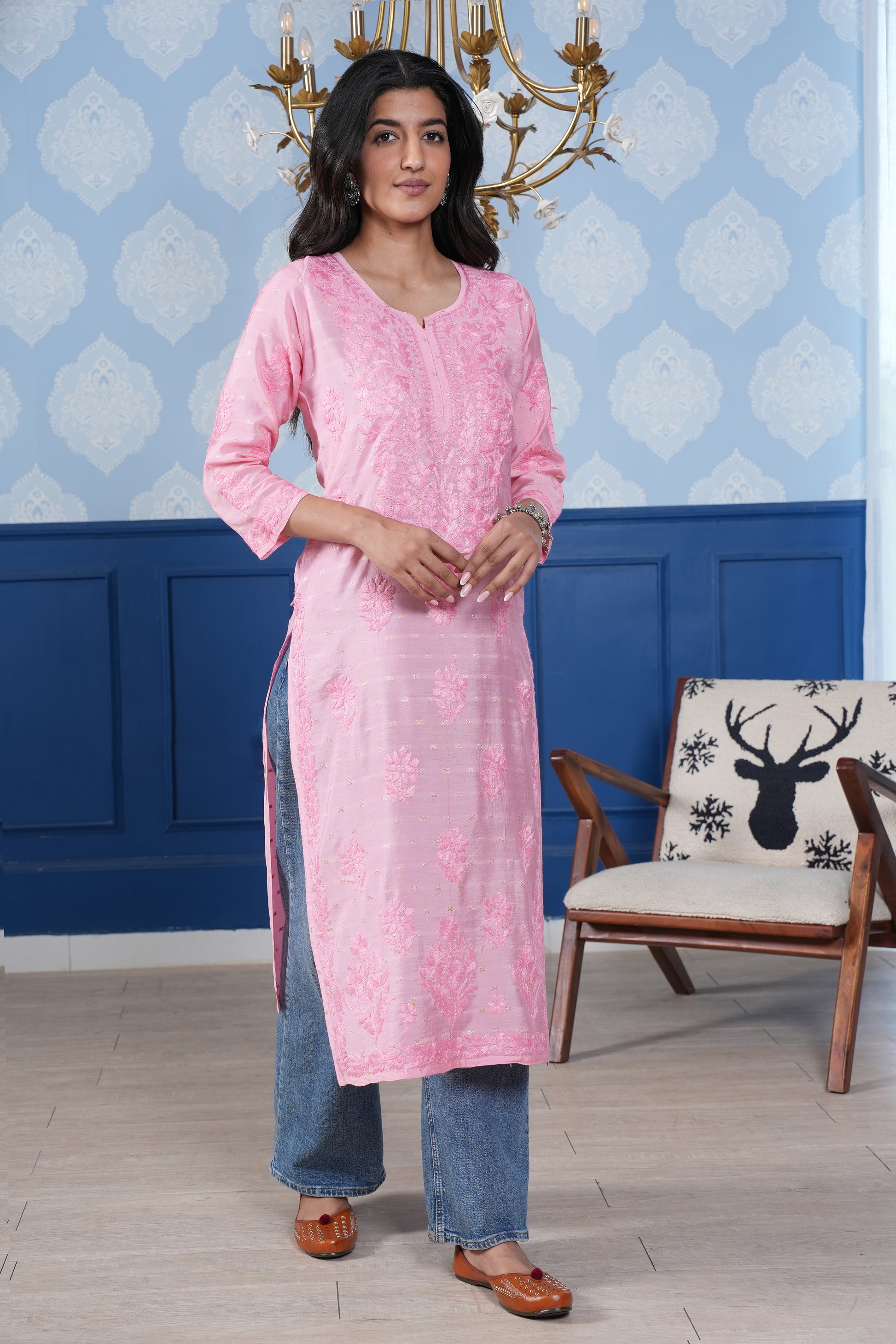 the intricate pink chikankari detailing enhances the kurta’s charm