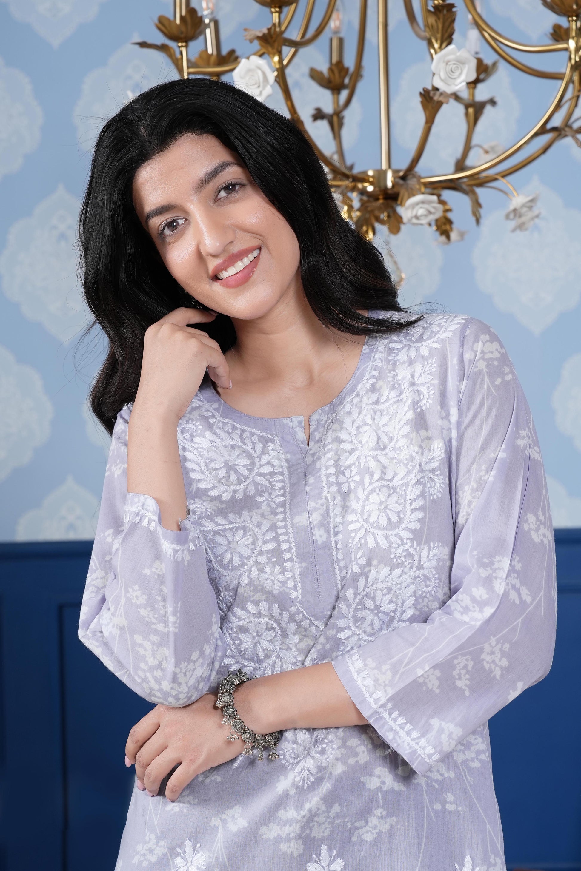 White chikankari embroidery detailing on neckline 