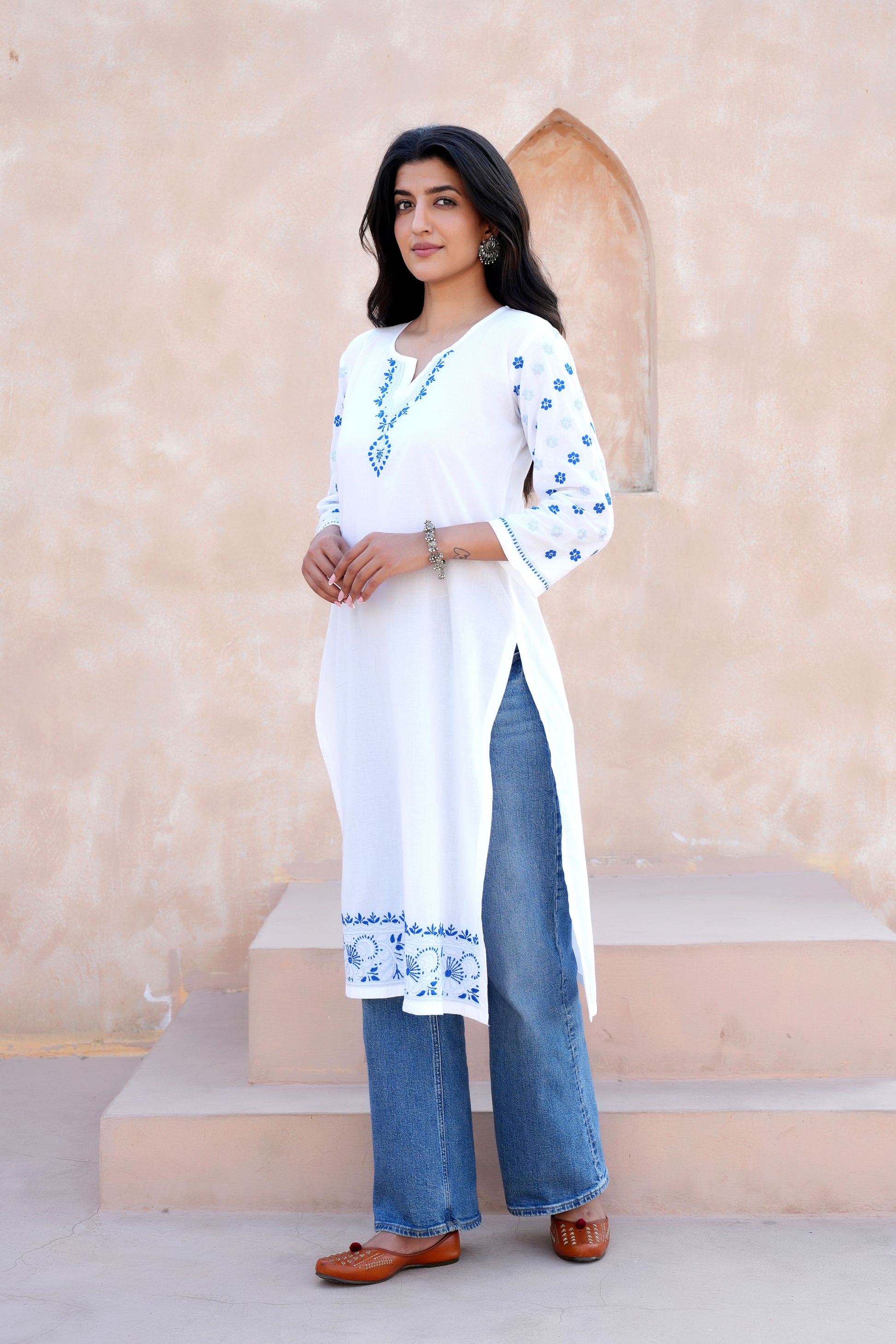 A slightly crinkled texture and a soft, flowing drape.