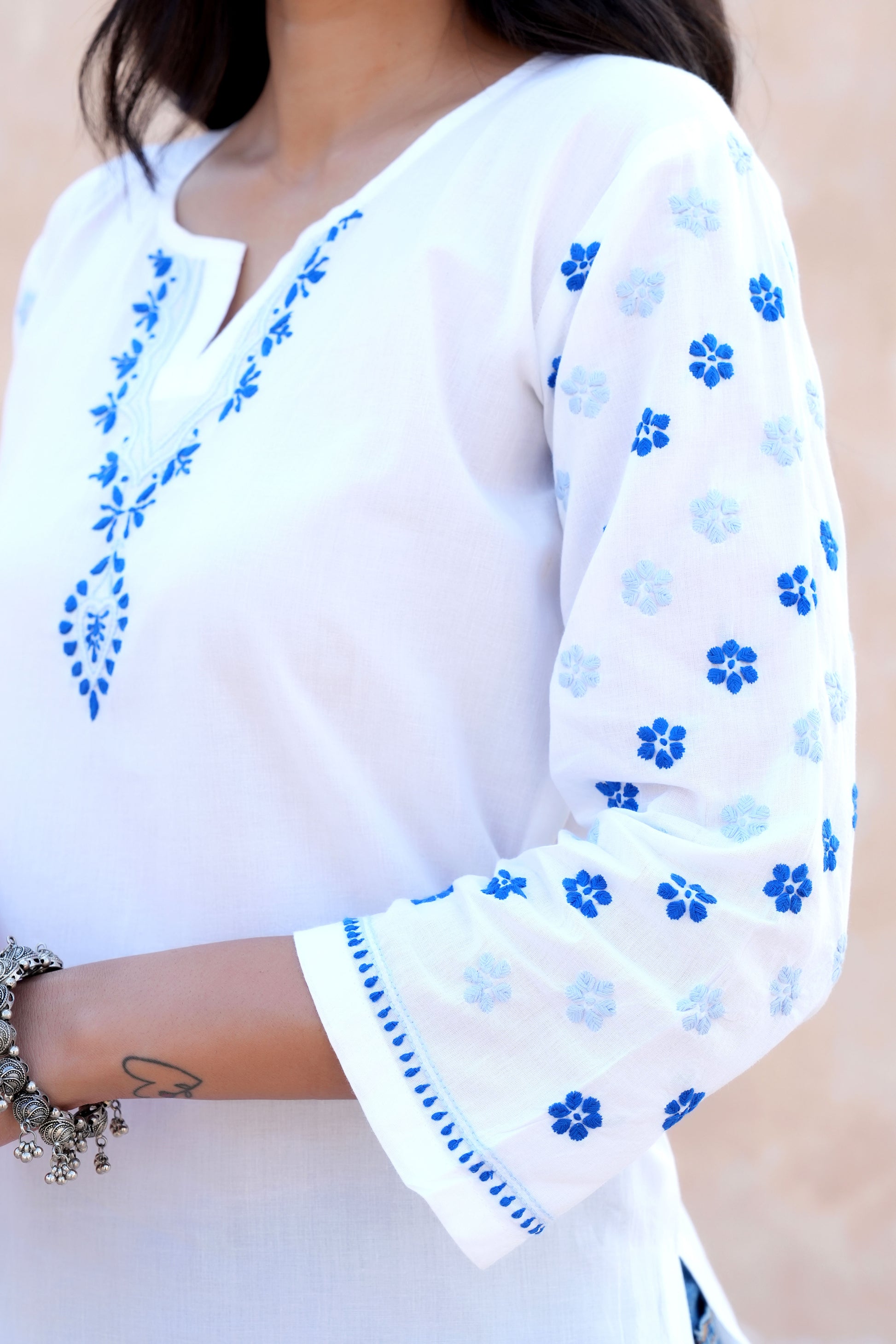 This cotton Chikankari kurta offers a perfect blend of modern style and traditional charm