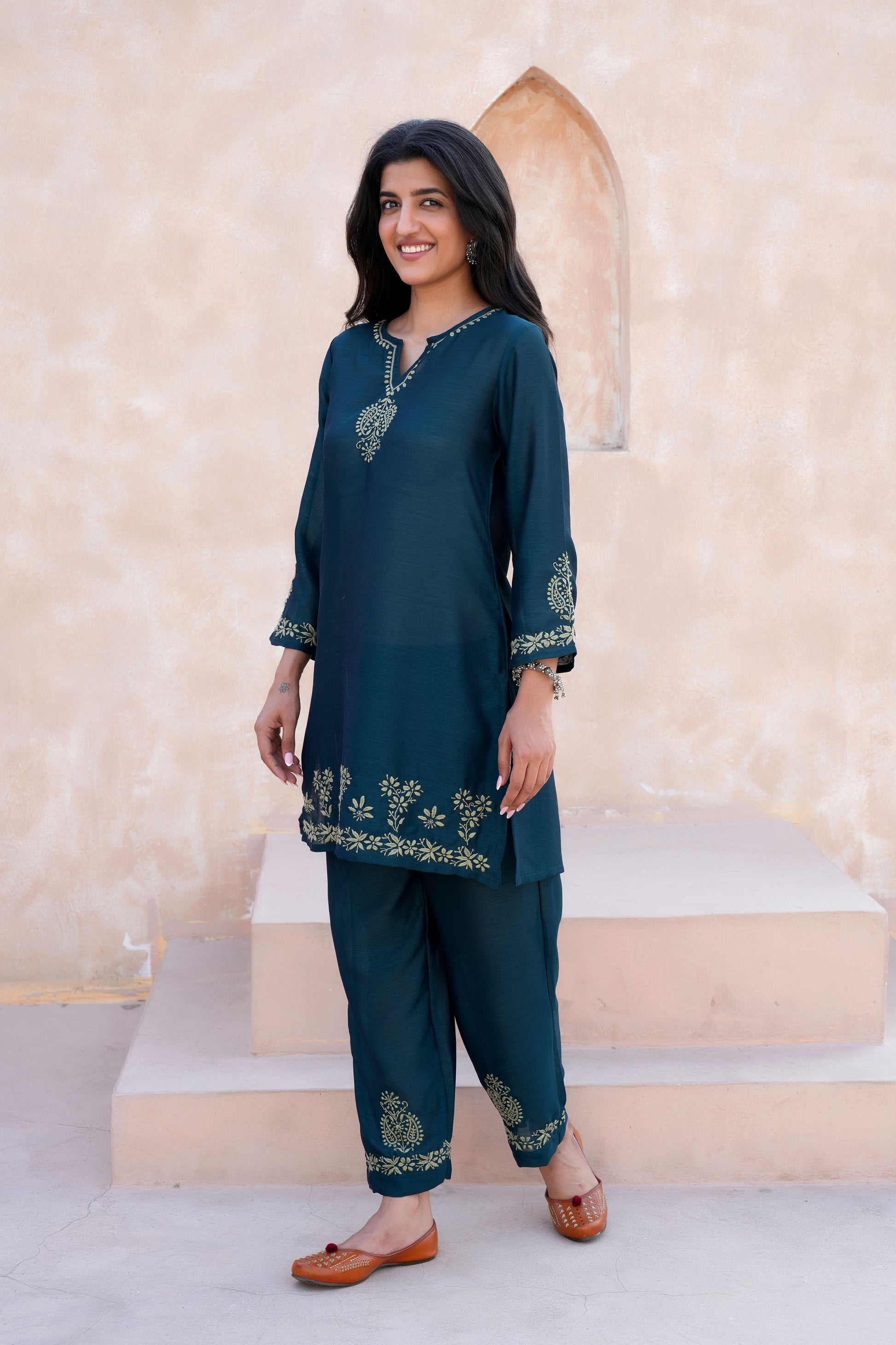 Handcrafted embroidery adds a unique and sophisticated touch
