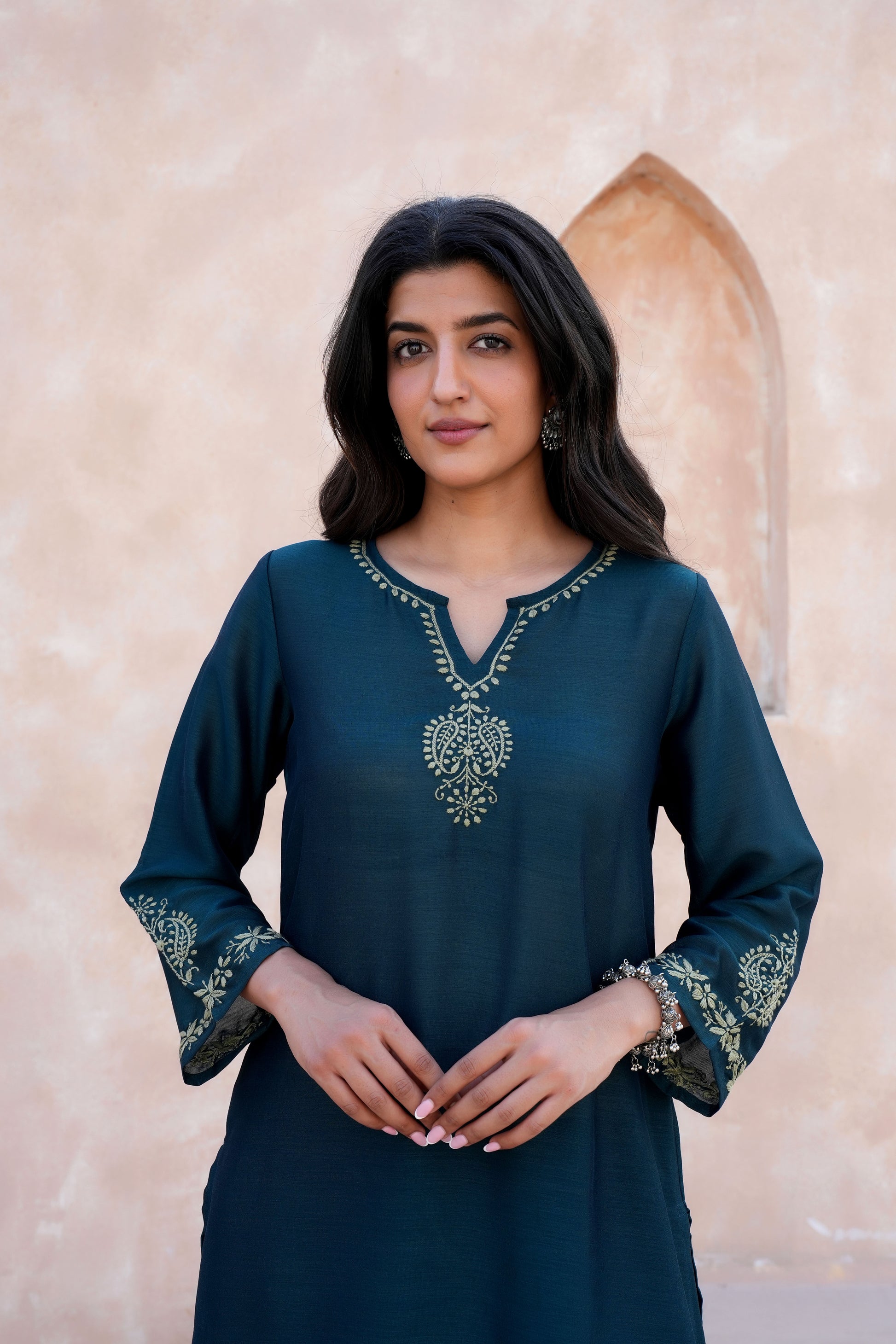 A slightly crinkled texture and a soft, flowing drape.