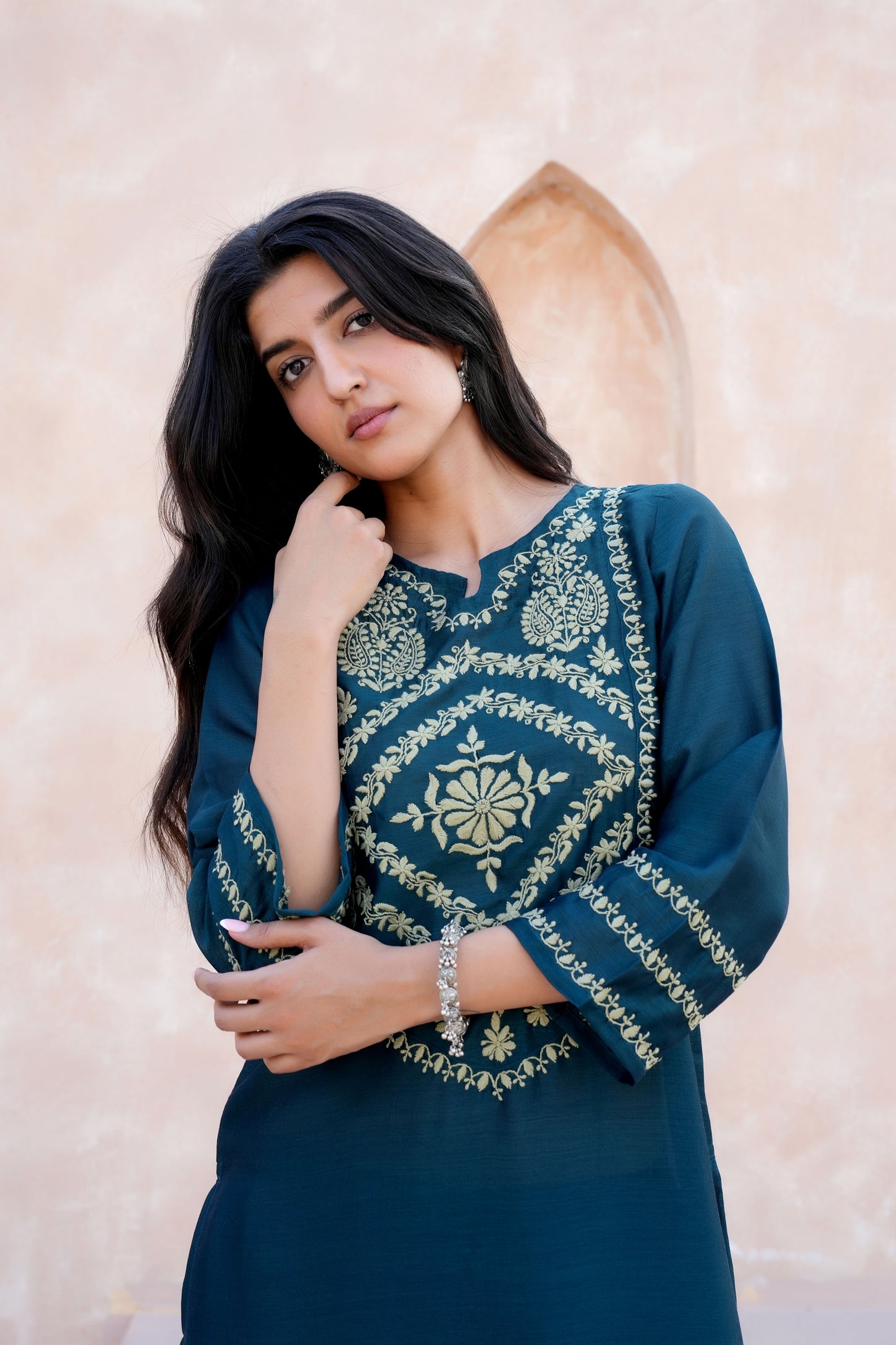 A slightly crinkled texture and a soft, flowing drape.