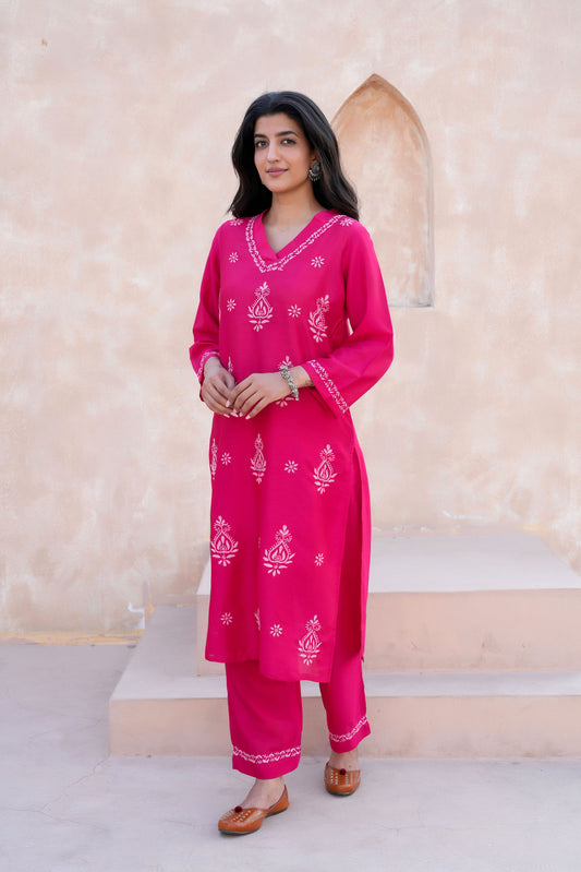 Handcrafted embroidery adds a unique and sophisticated touch.