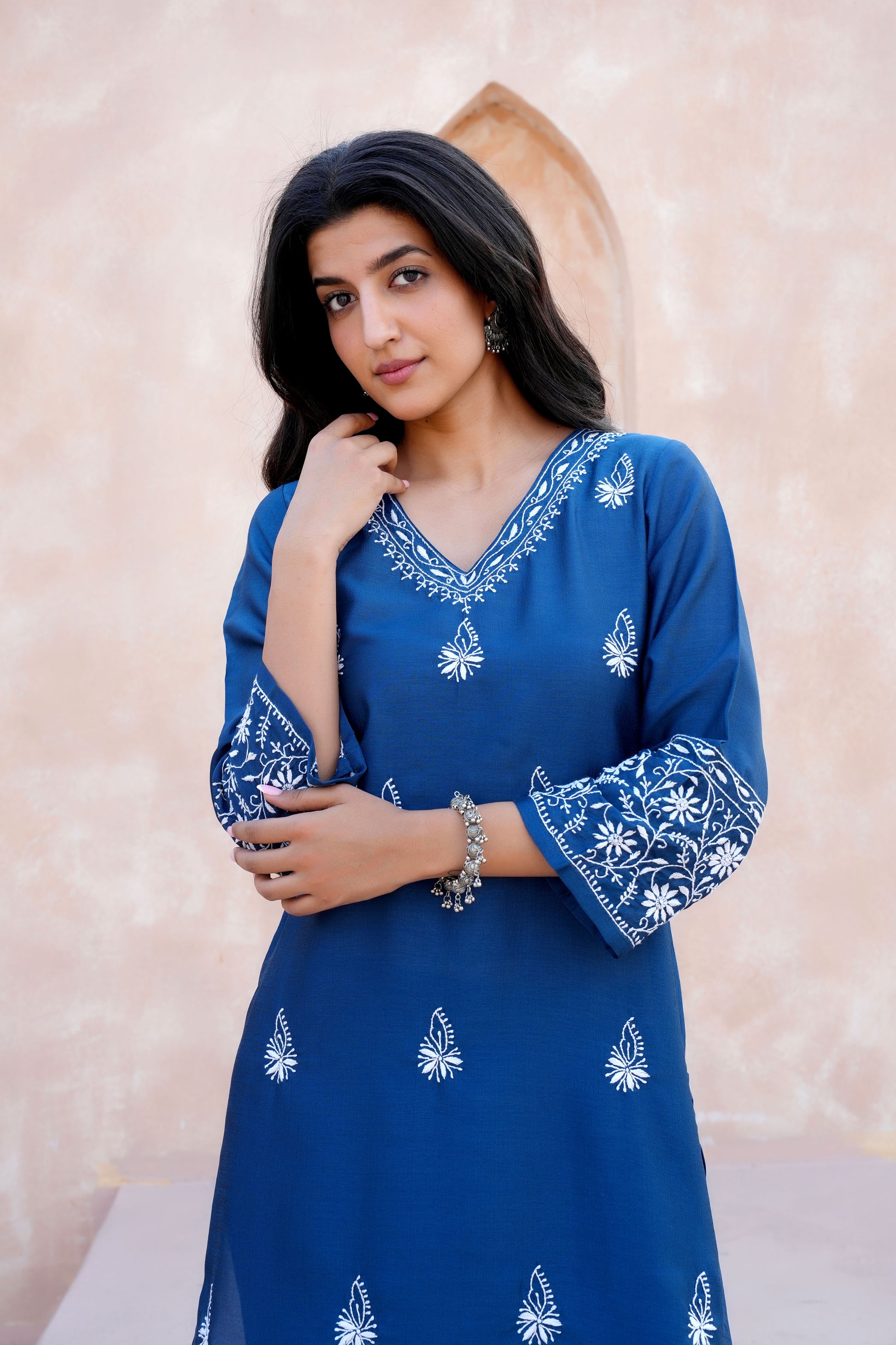 A slightly crinkled texture and a soft, flowing drape