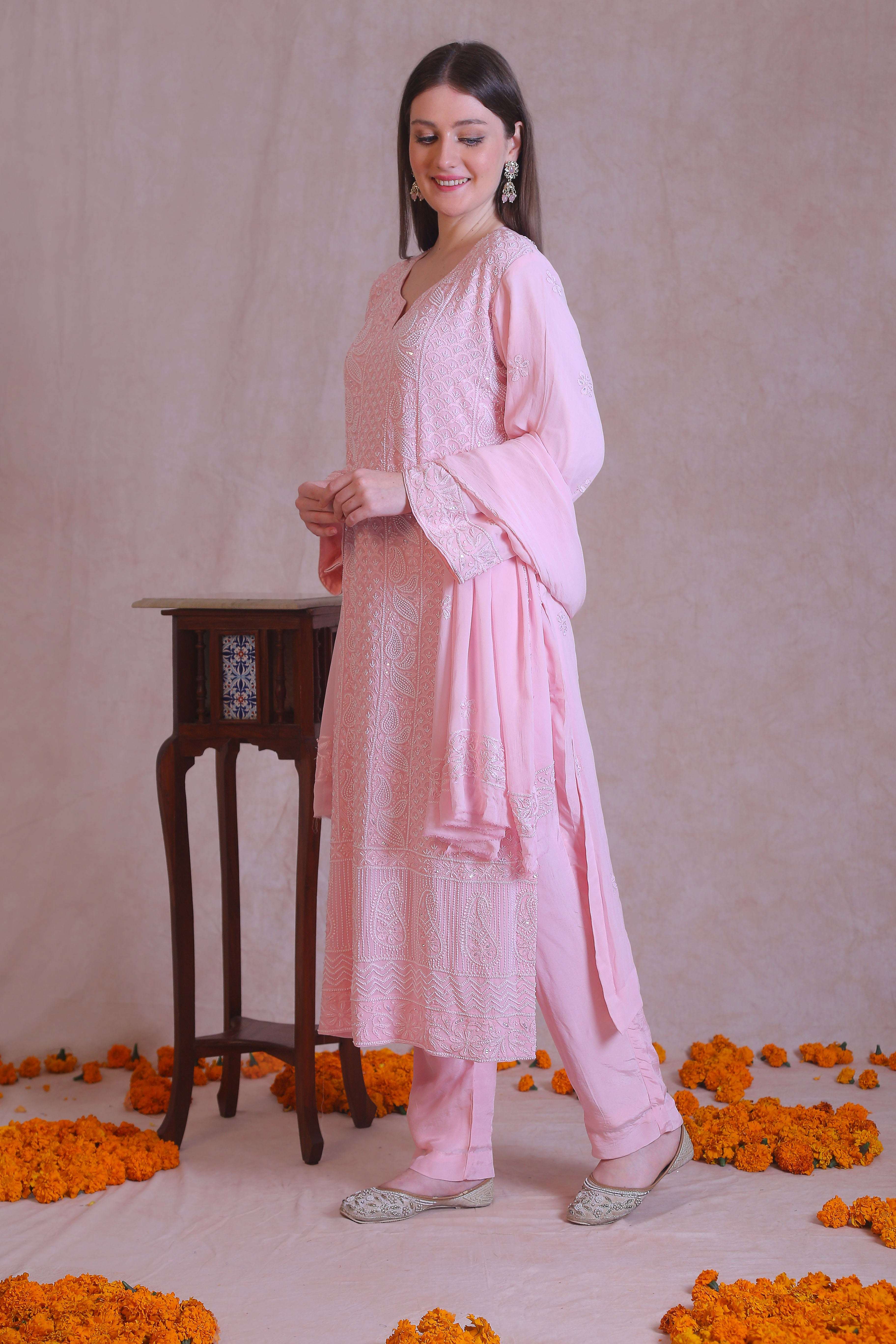 featuring intricate resham thread chikankari  and embellished with dainty cutdana, sequins and pote (little pearl). 