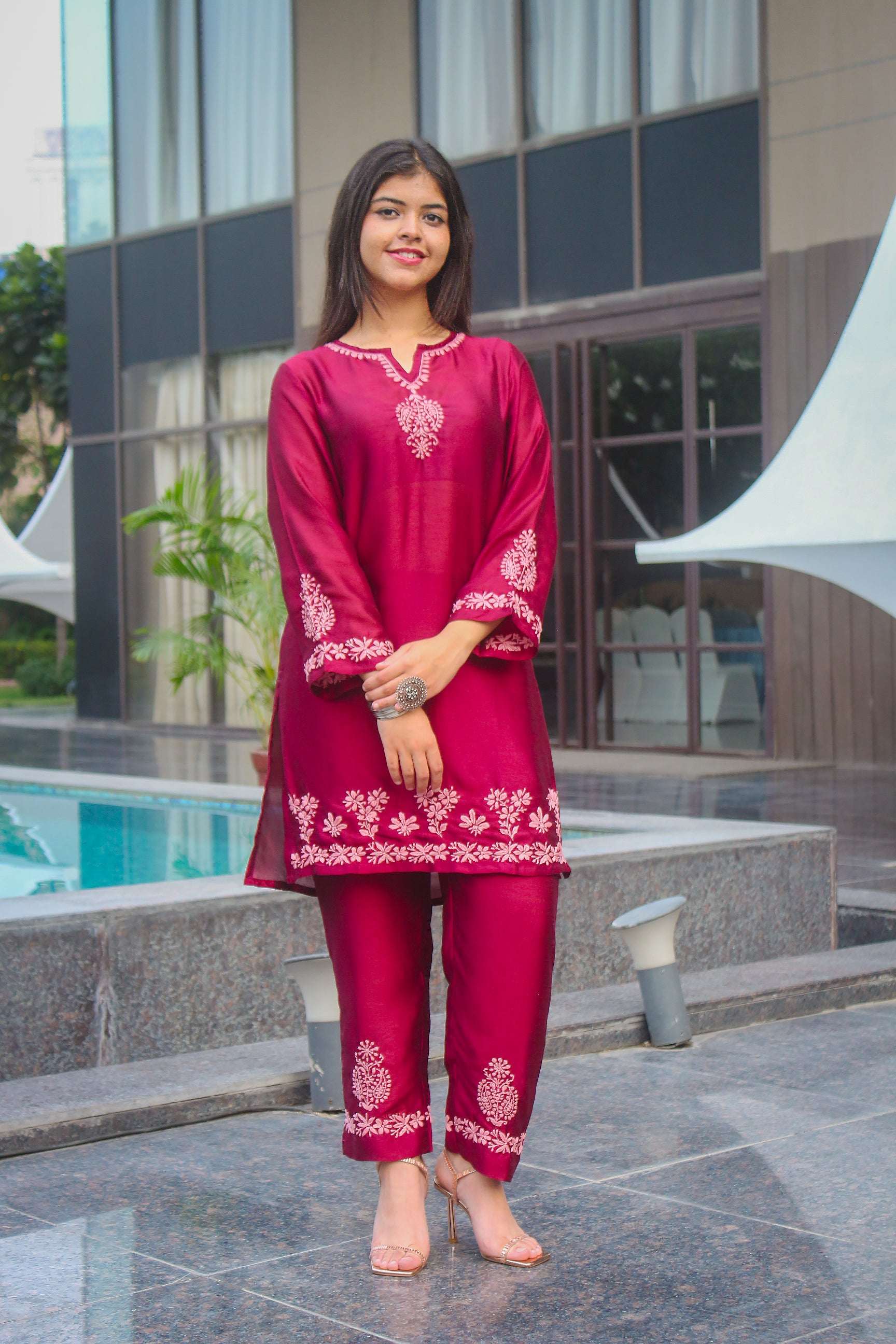 This Poly silk Chikankari kurta set offers a perfect blend of modern style and traditional charm. 