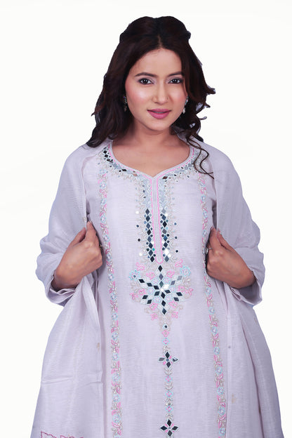 This suit has a hand-embellished neck embroidery that adds a touch of luxury 